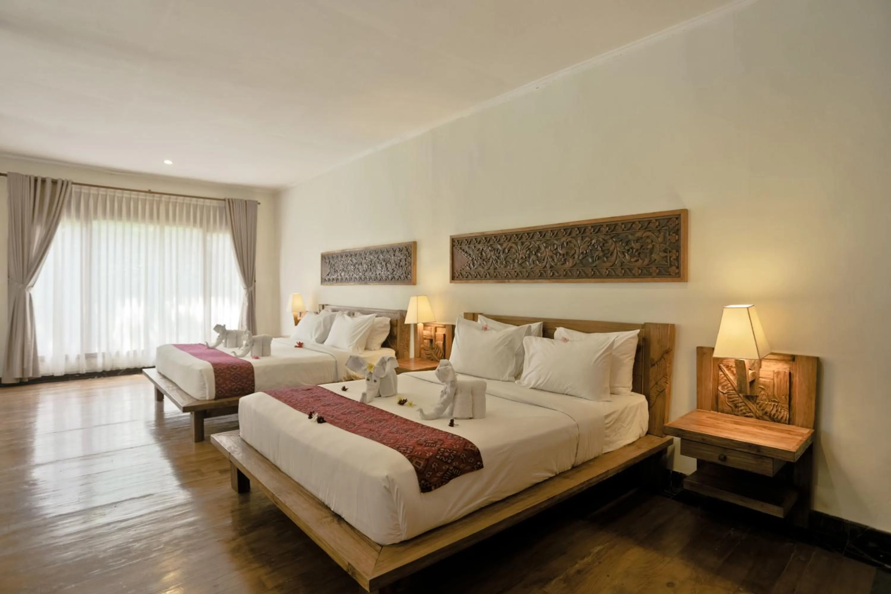 Decorative detail, Bed in Sri Ratih Cottages, CHSE Certified