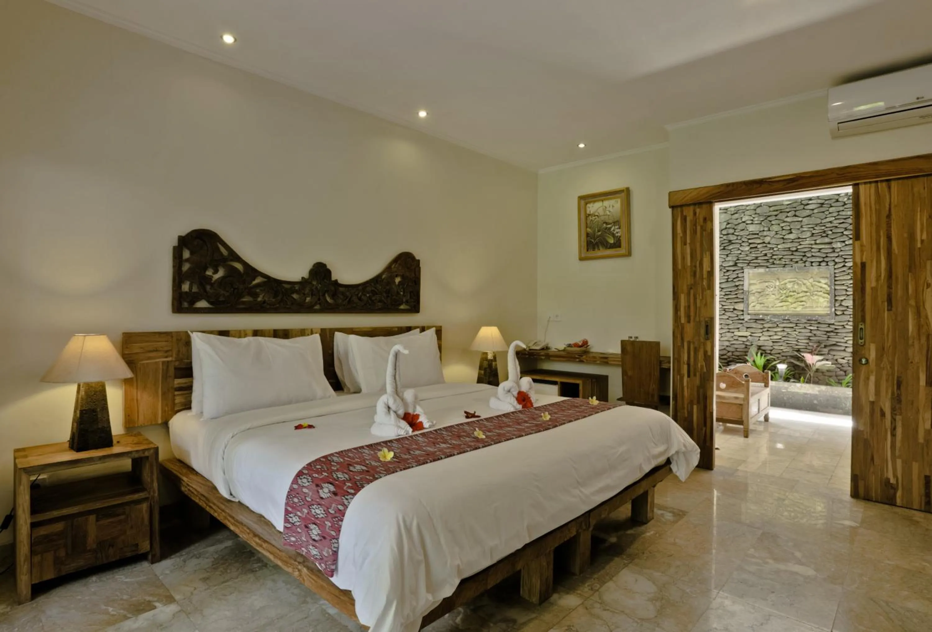 Photo of the whole room, Bed in Sri Ratih Cottages, CHSE Certified