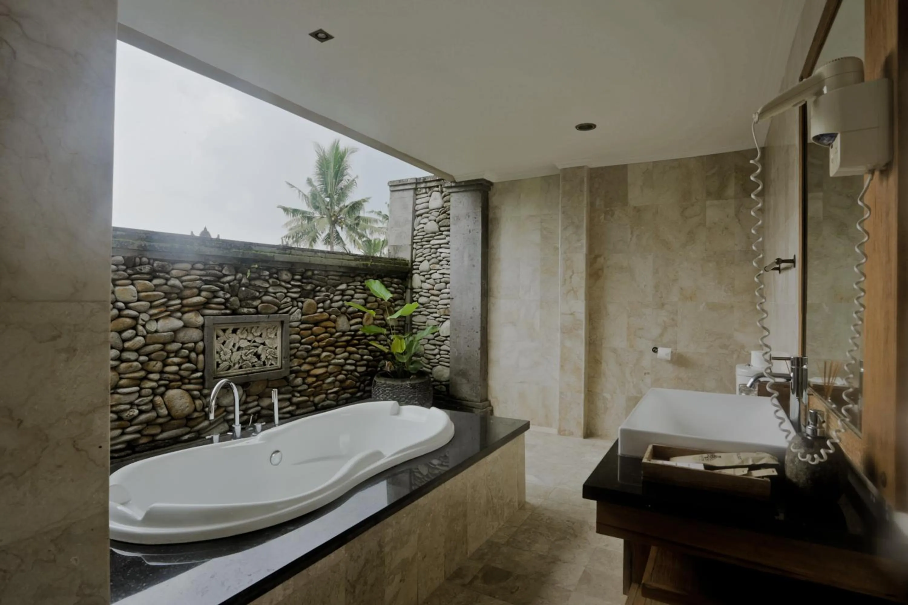 Shower in Sri Ratih Cottages, CHSE Certified