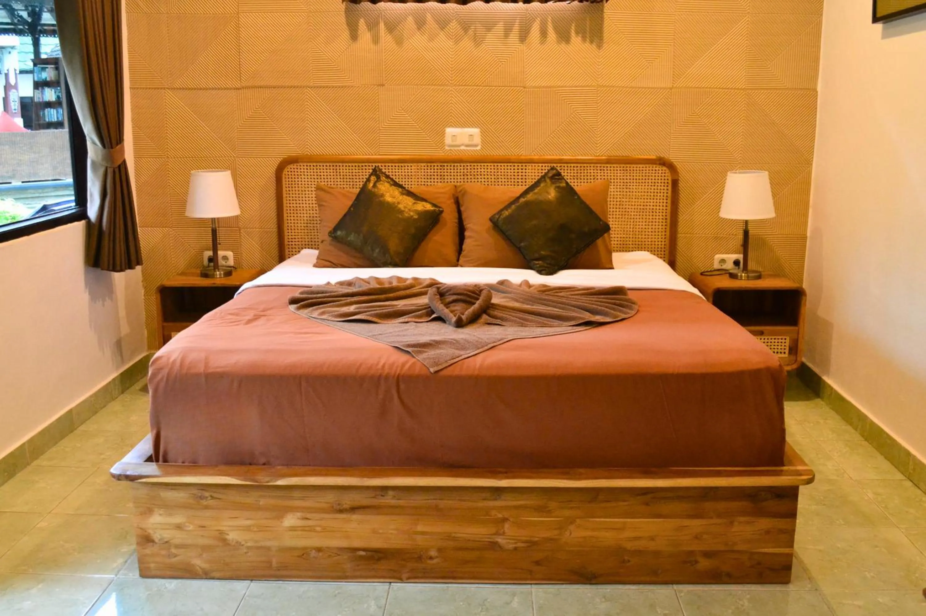 Bed in Absolute Scuba Bali Dive Resort