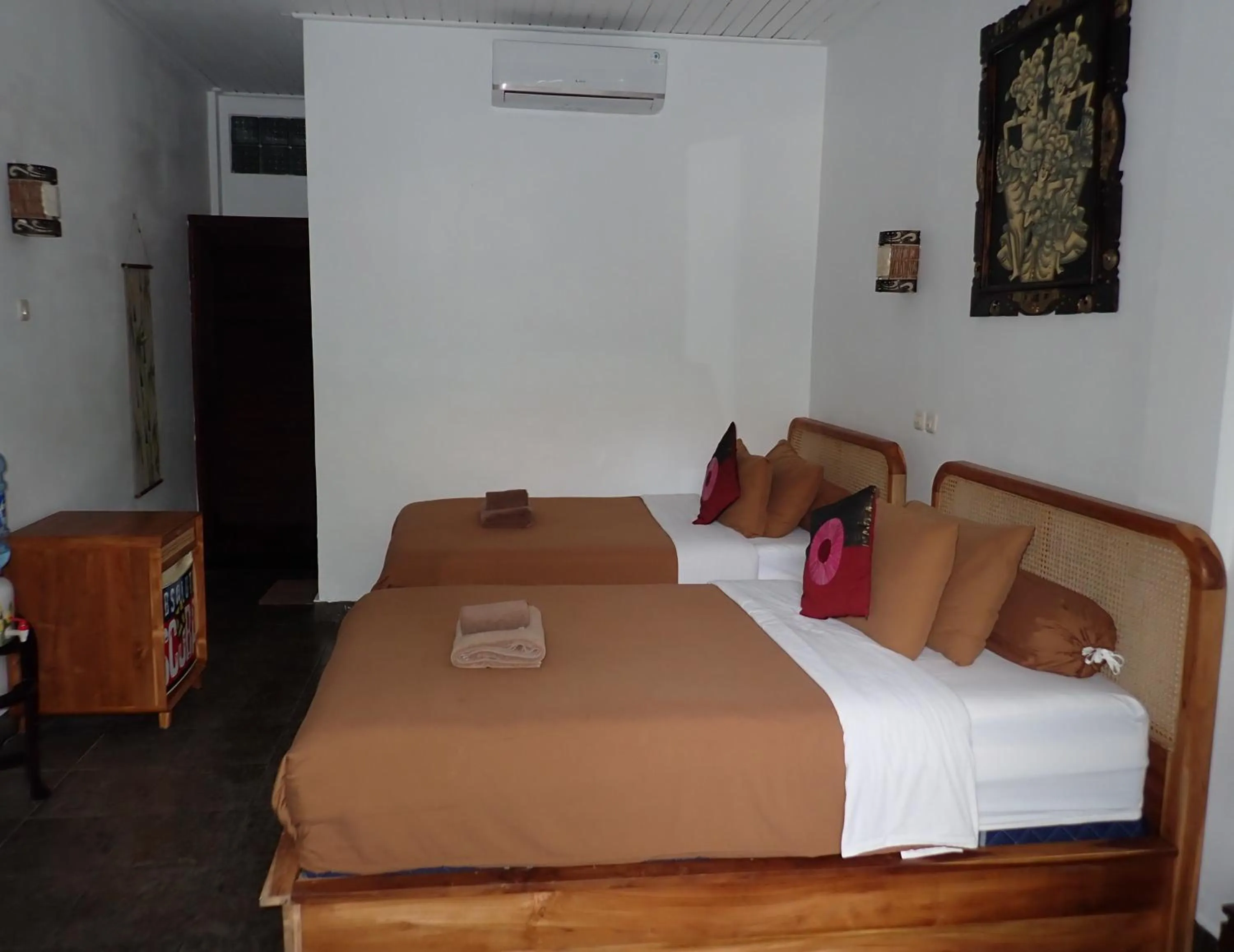 Bed in Absolute Scuba Bali Dive Resort