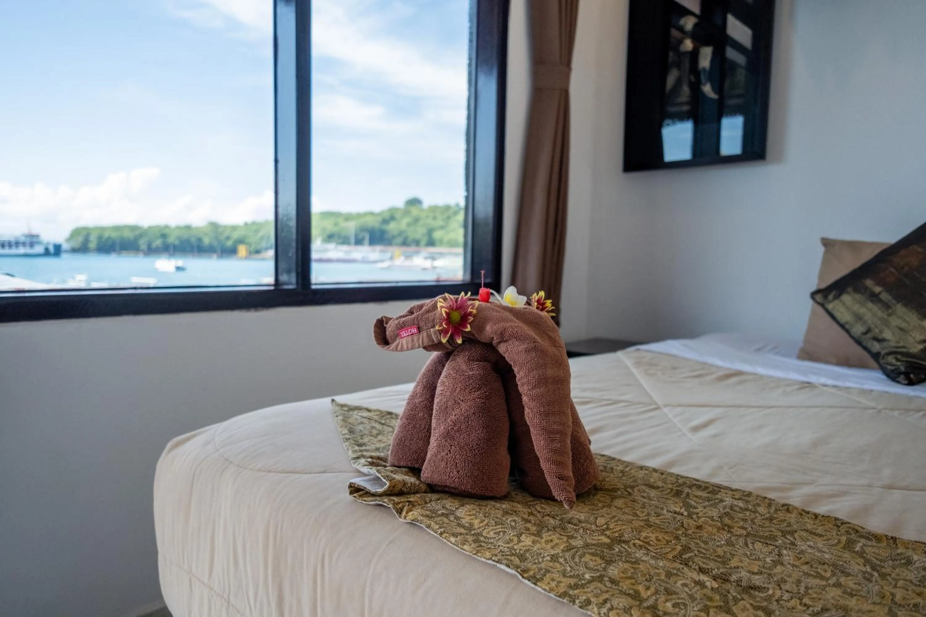 Bed in Absolute Scuba Bali Dive Resort