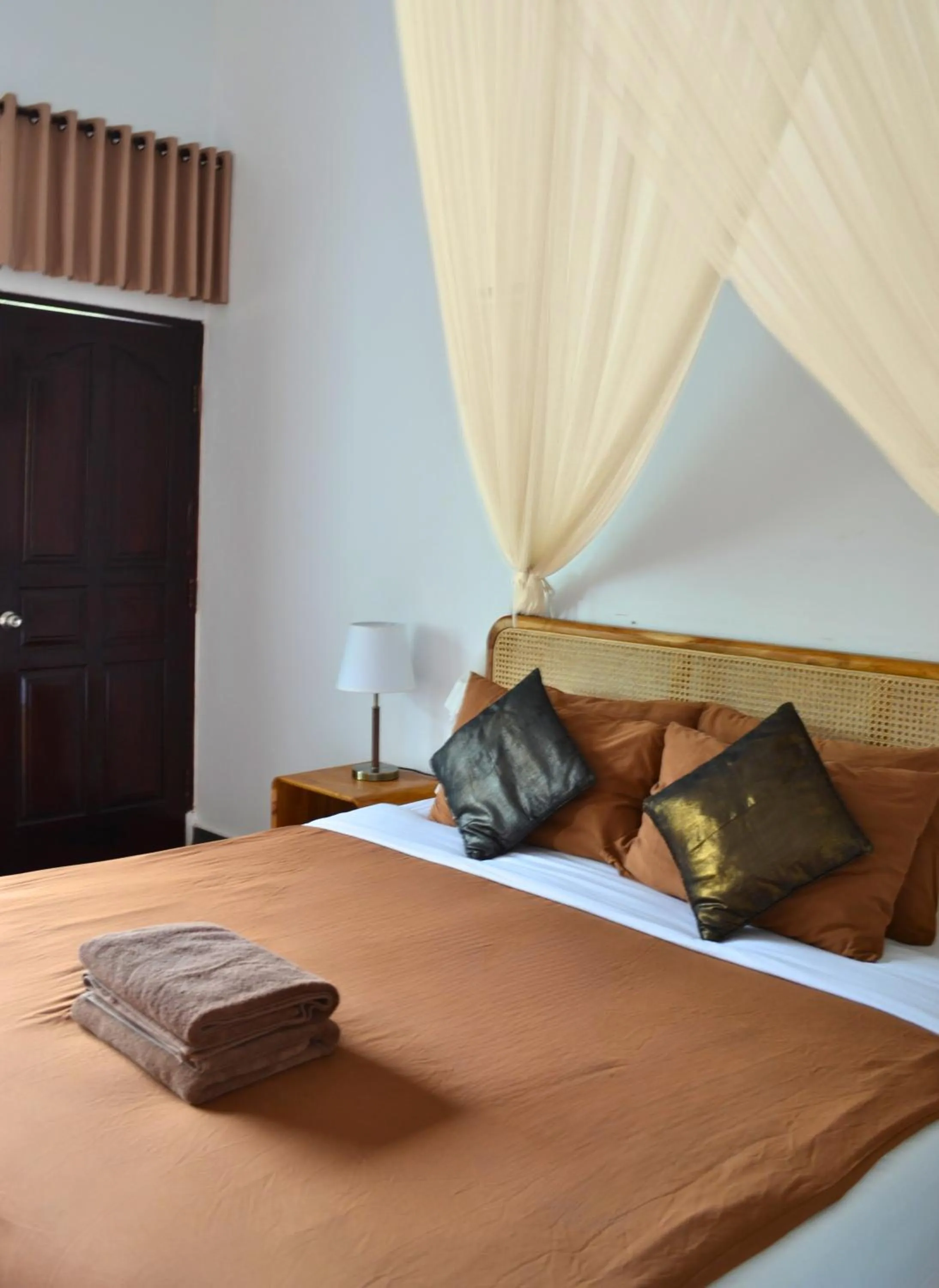 Bed in Absolute Scuba Bali Dive Resort