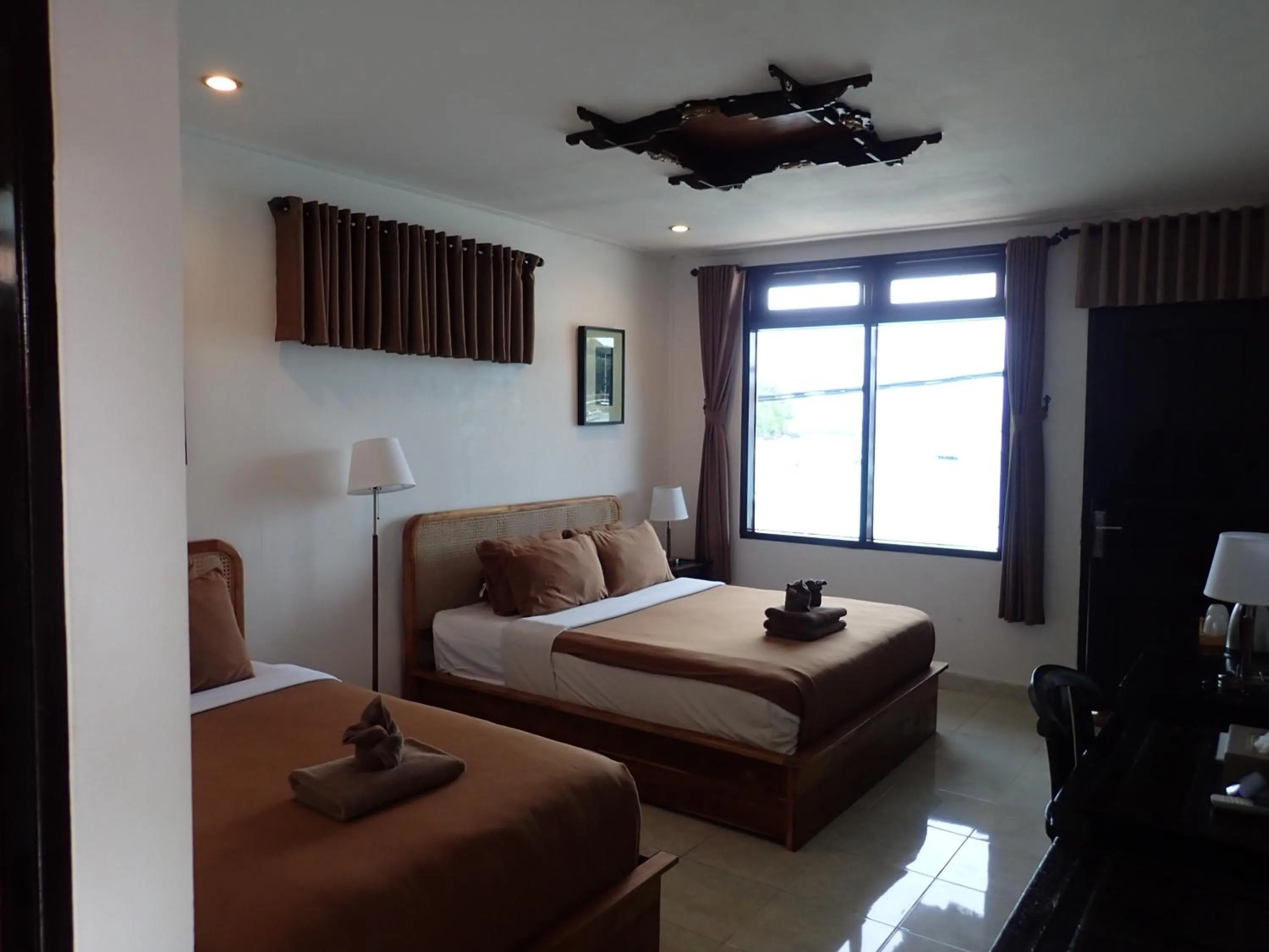 Bed in Absolute Scuba Bali Dive Resort