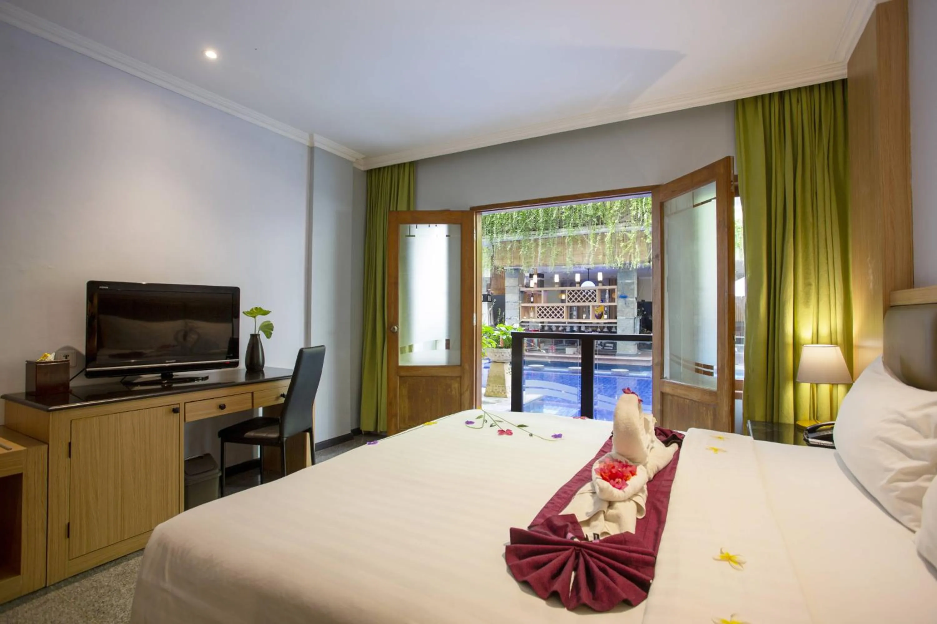 Bed in Famous Hotel Kuta Formerly Permata Kuta Hotel