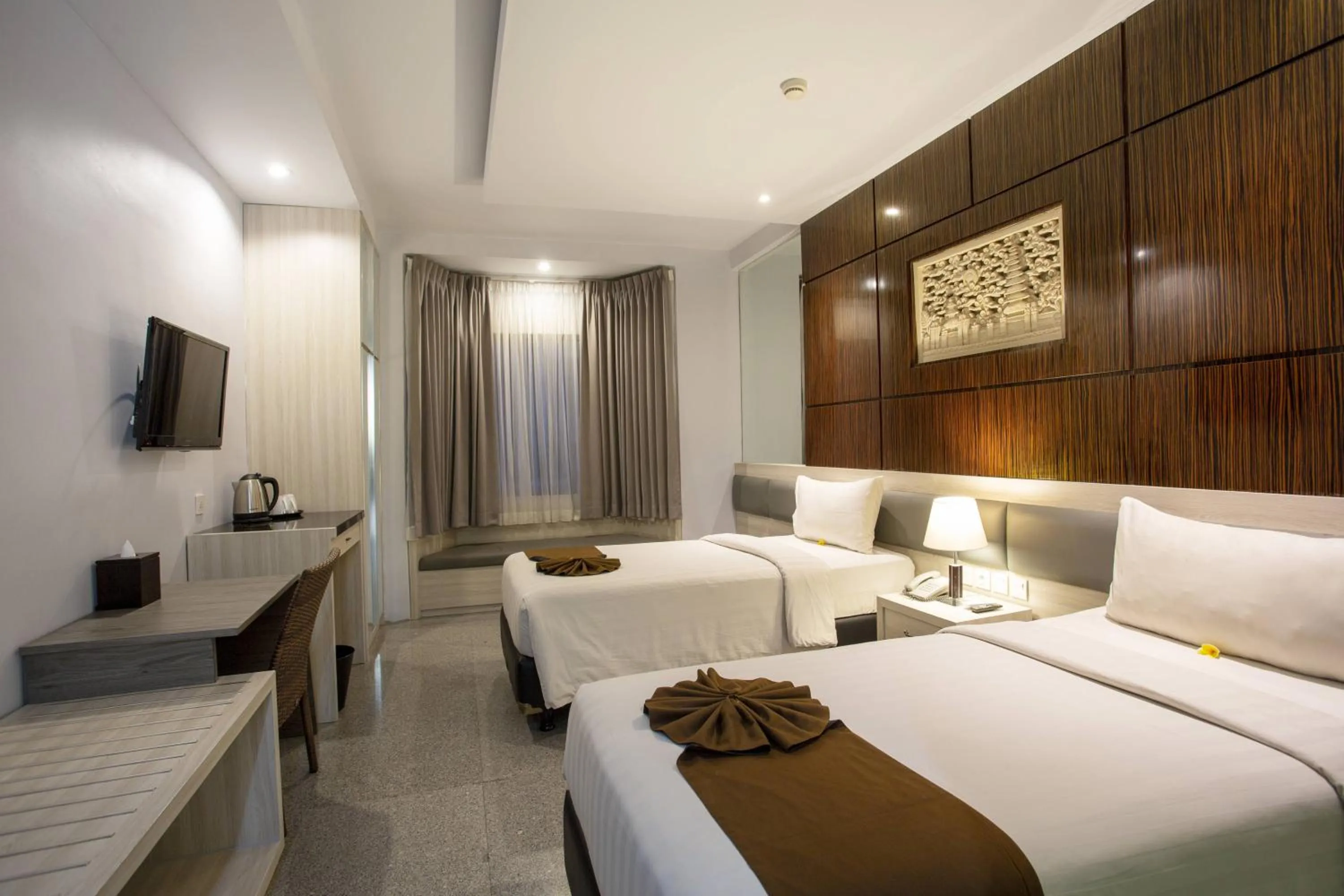 Bed in Famous Hotel Kuta Formerly Permata Kuta Hotel