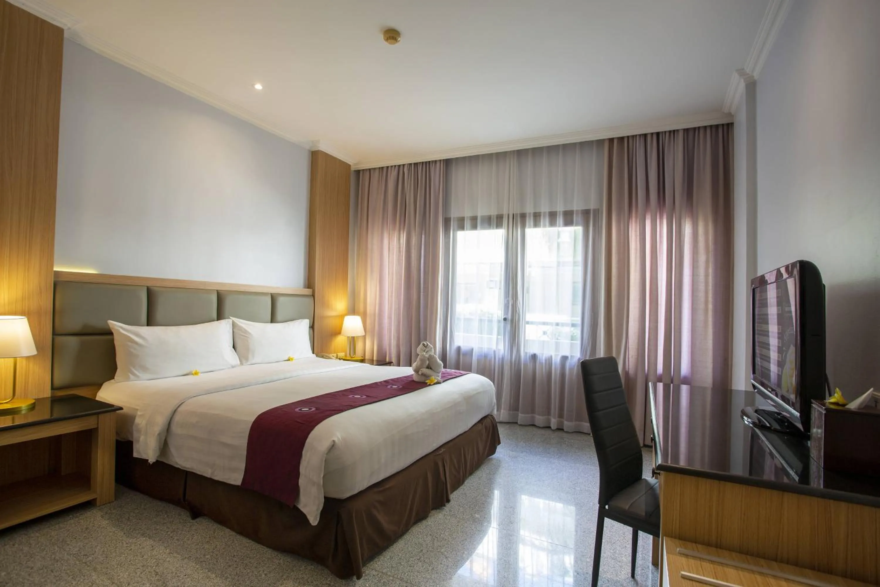 Deluxe Room with Extra Bed - single occupancy in Famous Hotel Kuta Formerly Permata Kuta Hotel