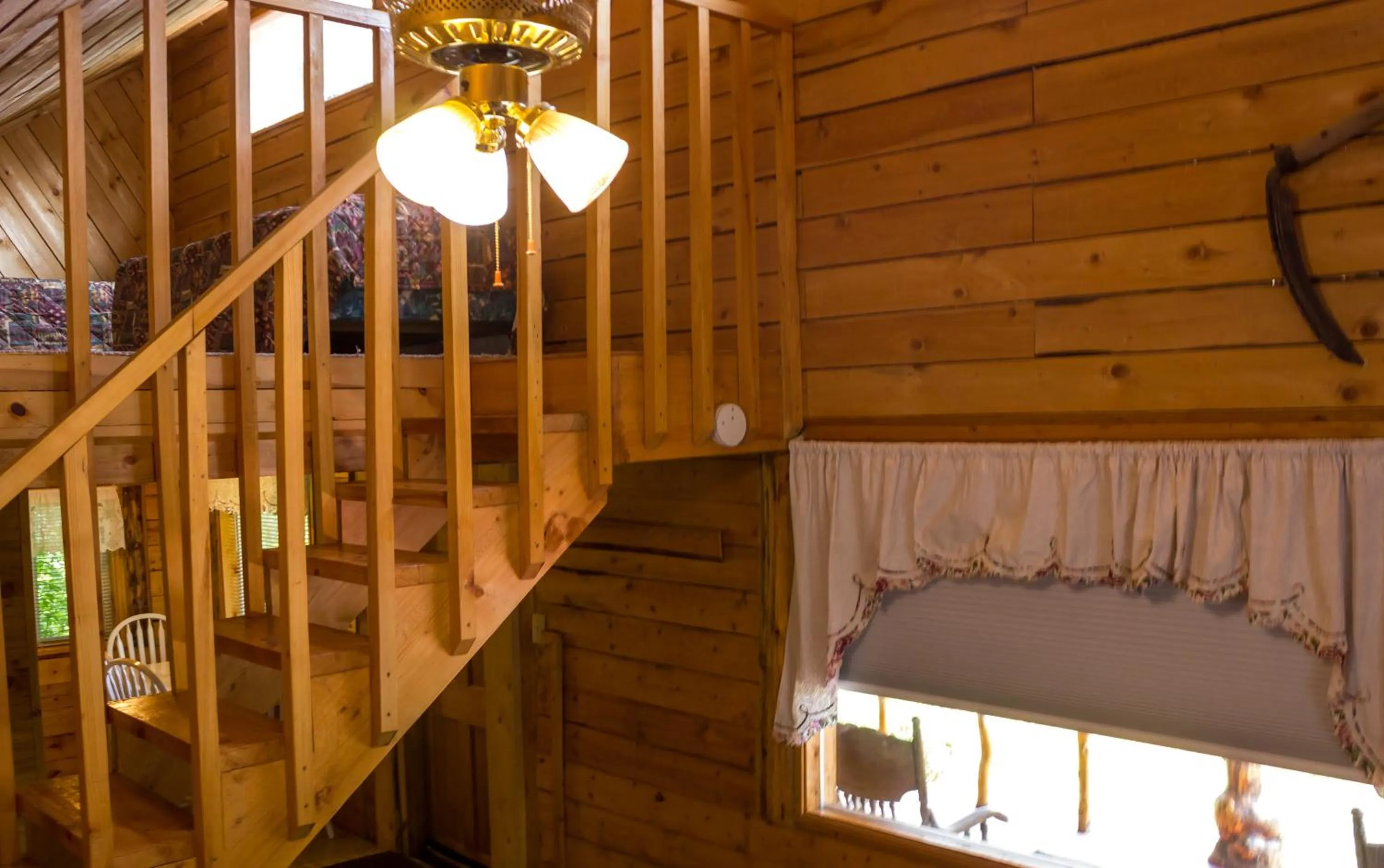 Bed in Midnight Sun Log Cabins