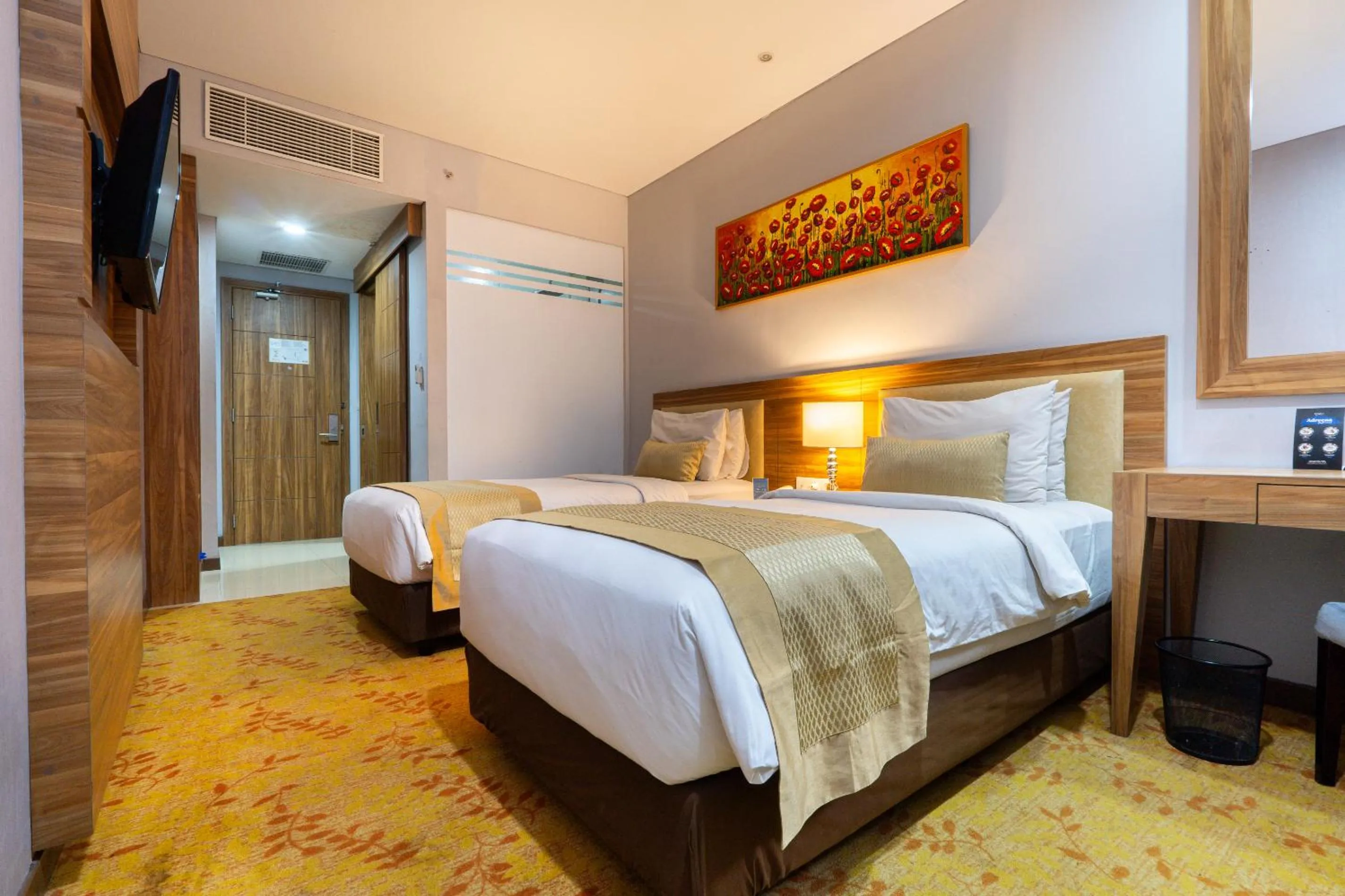 Bed in Grand Serela Yogyakarta