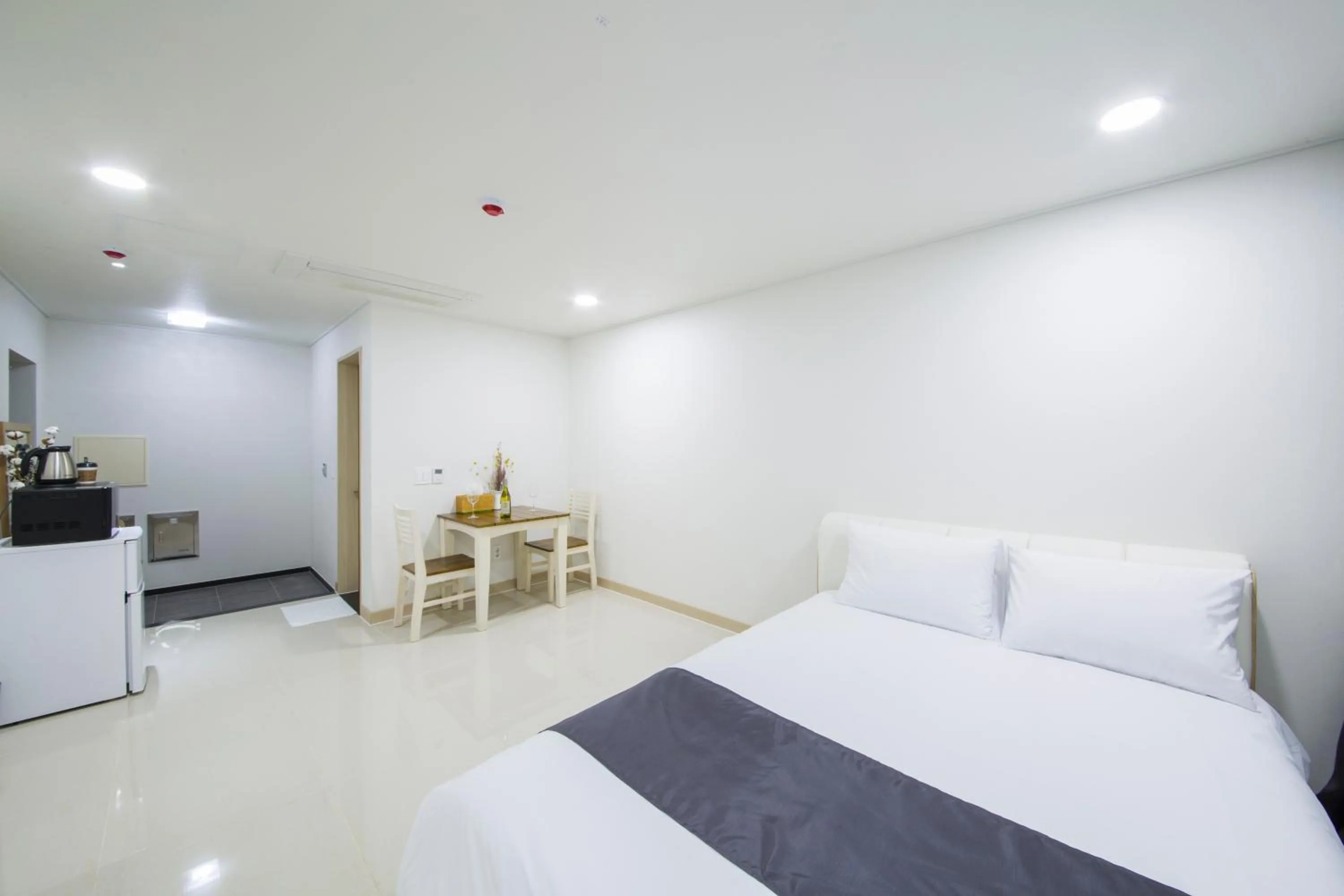 Bed in J Raum Resort