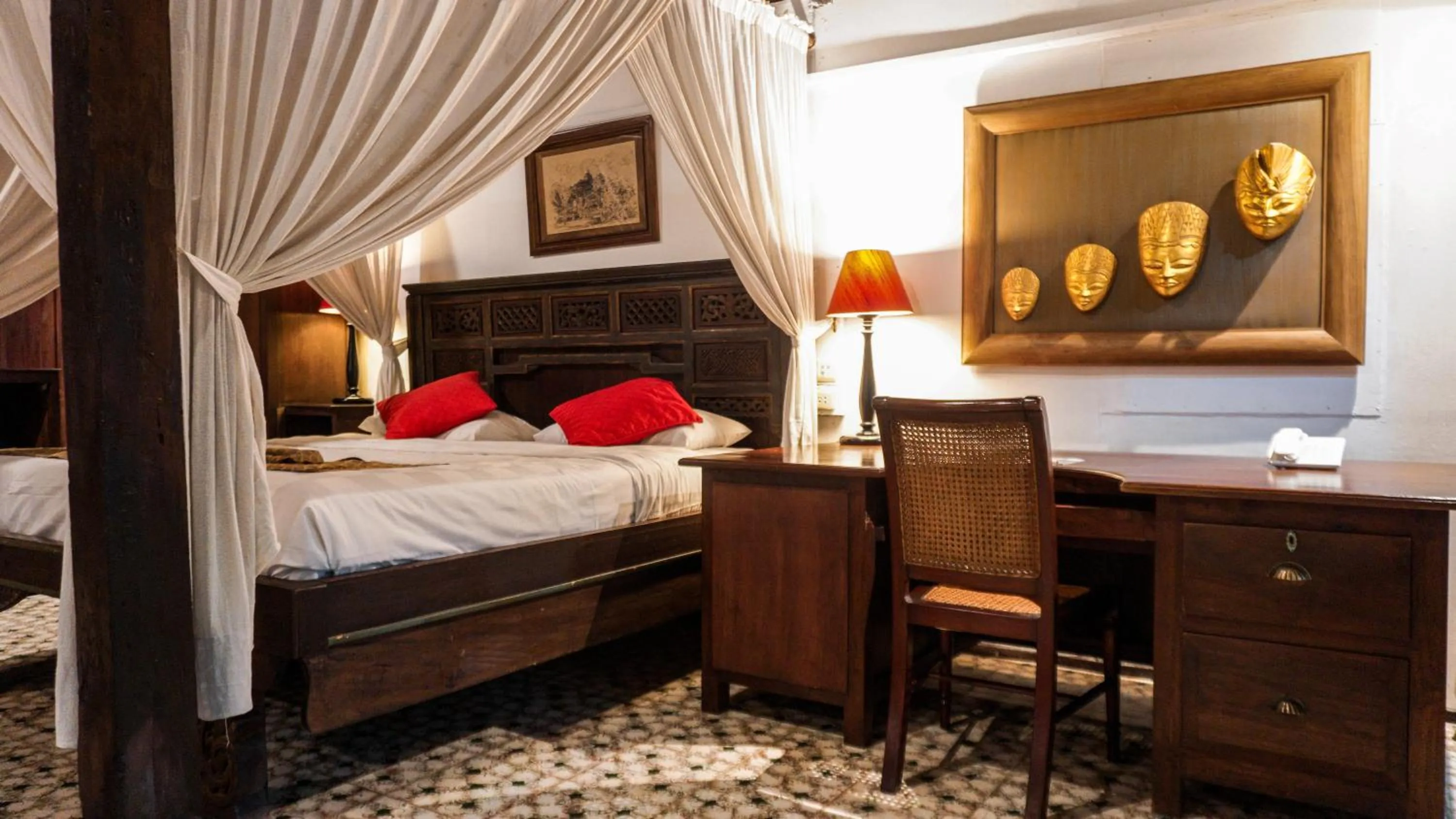 Bed in MesaStila Resort and Spa