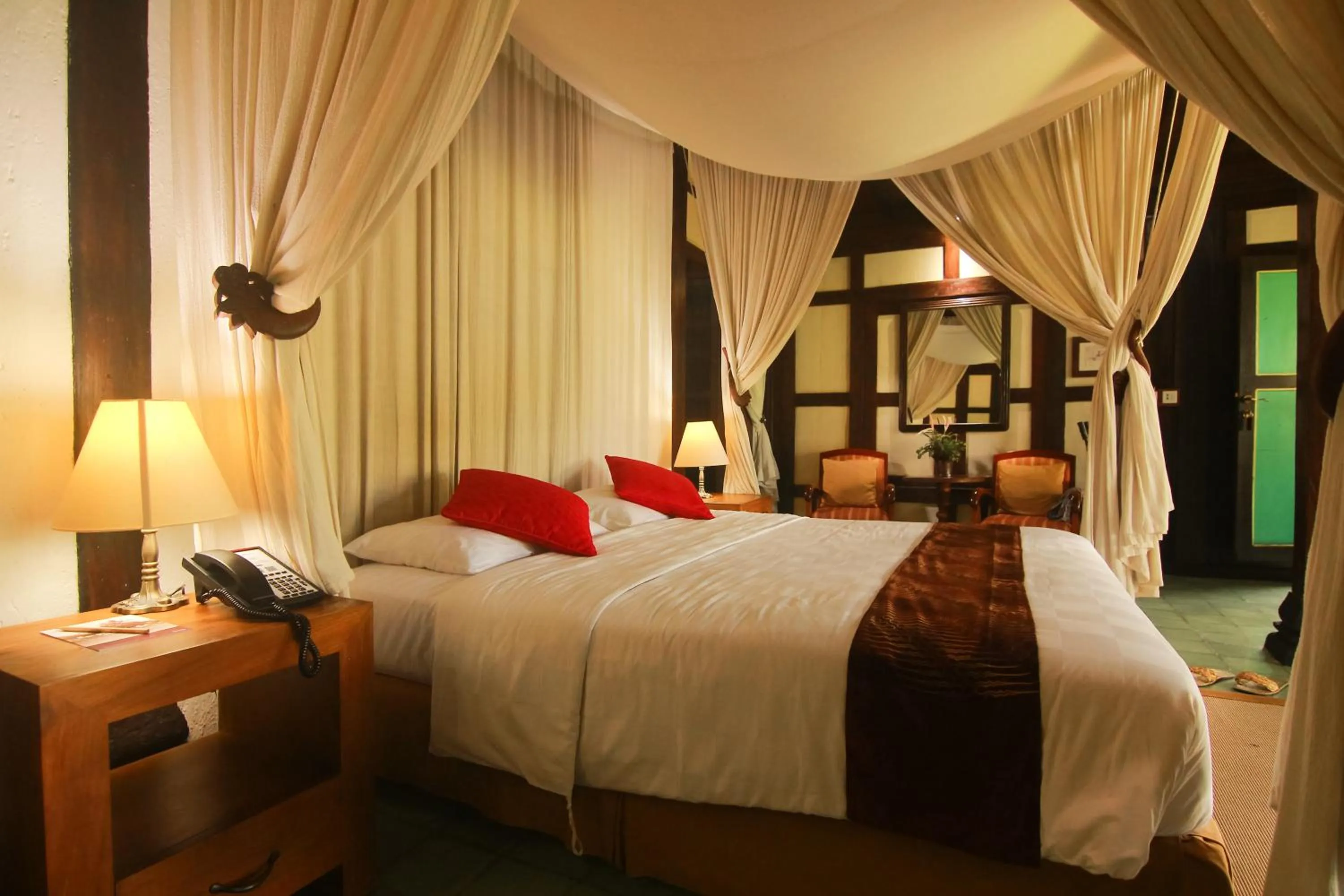 Bed in MesaStila Resort and Spa