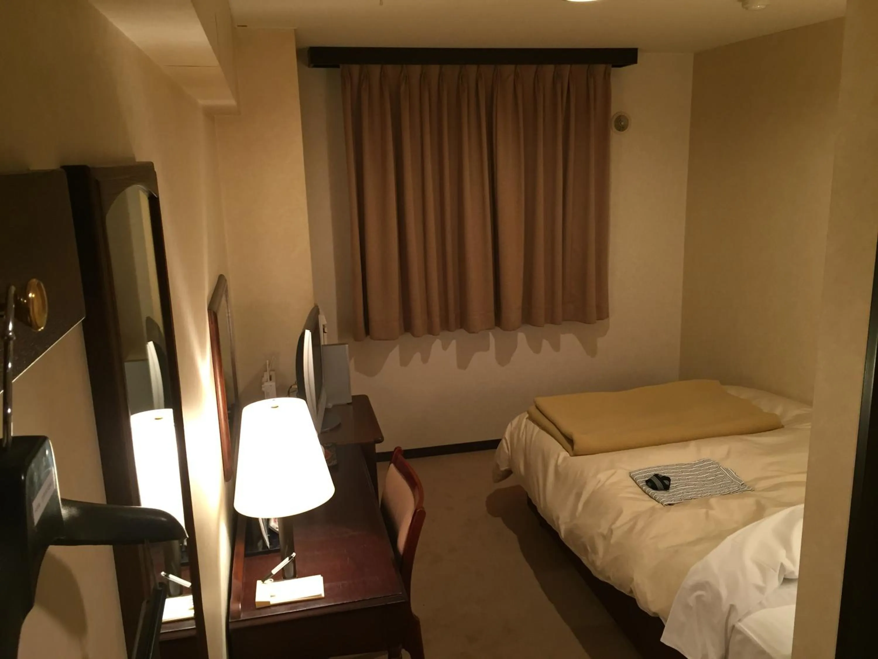 Photo of the whole room, Bed in Hotel Crown Hills Kitami