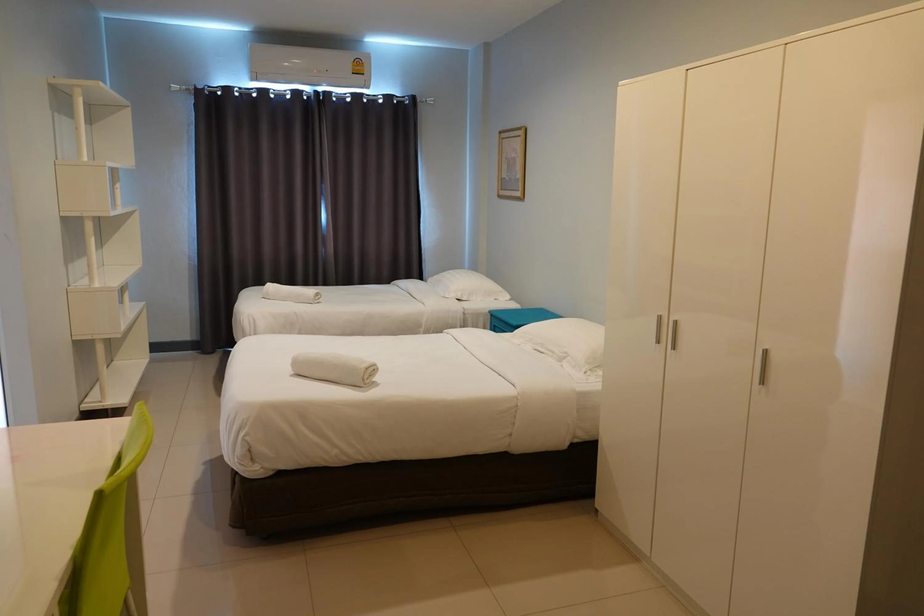Bed in ibeyond Apartment Romklao Suvarnabhumi