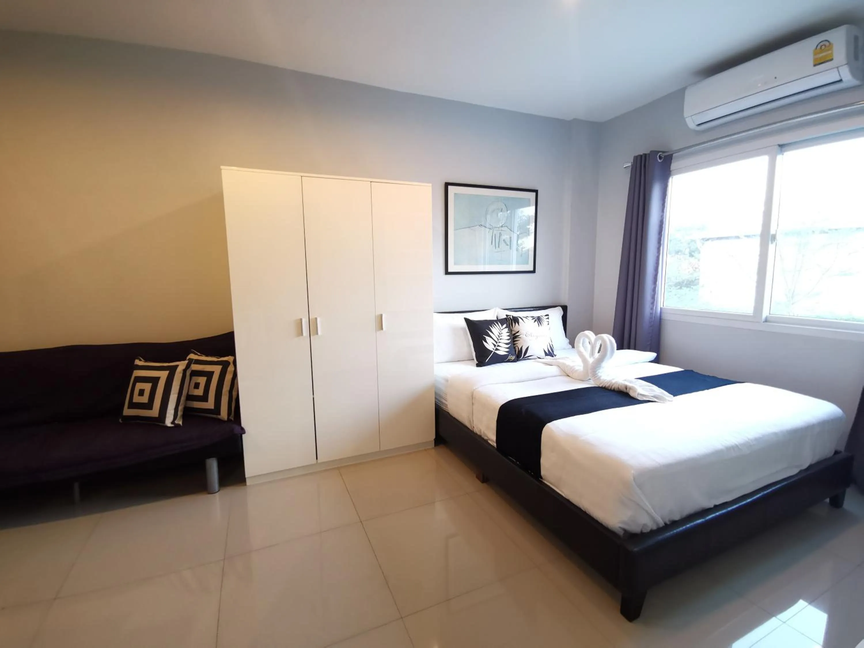 Photo of the whole room, Bed in ibeyond Apartment Romklao Suvarnabhumi