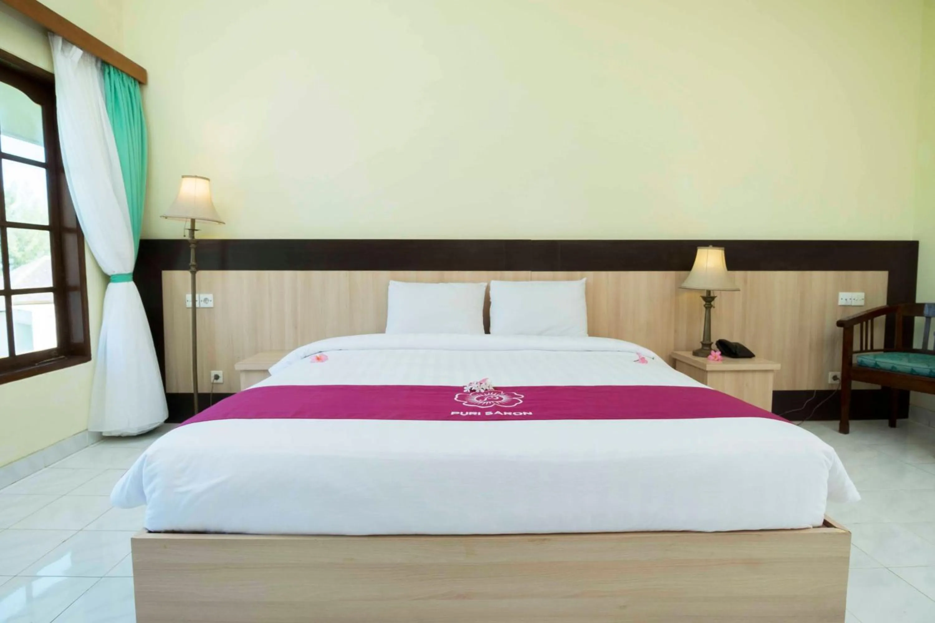 Bed in Puri Saron Senggigi Hotel