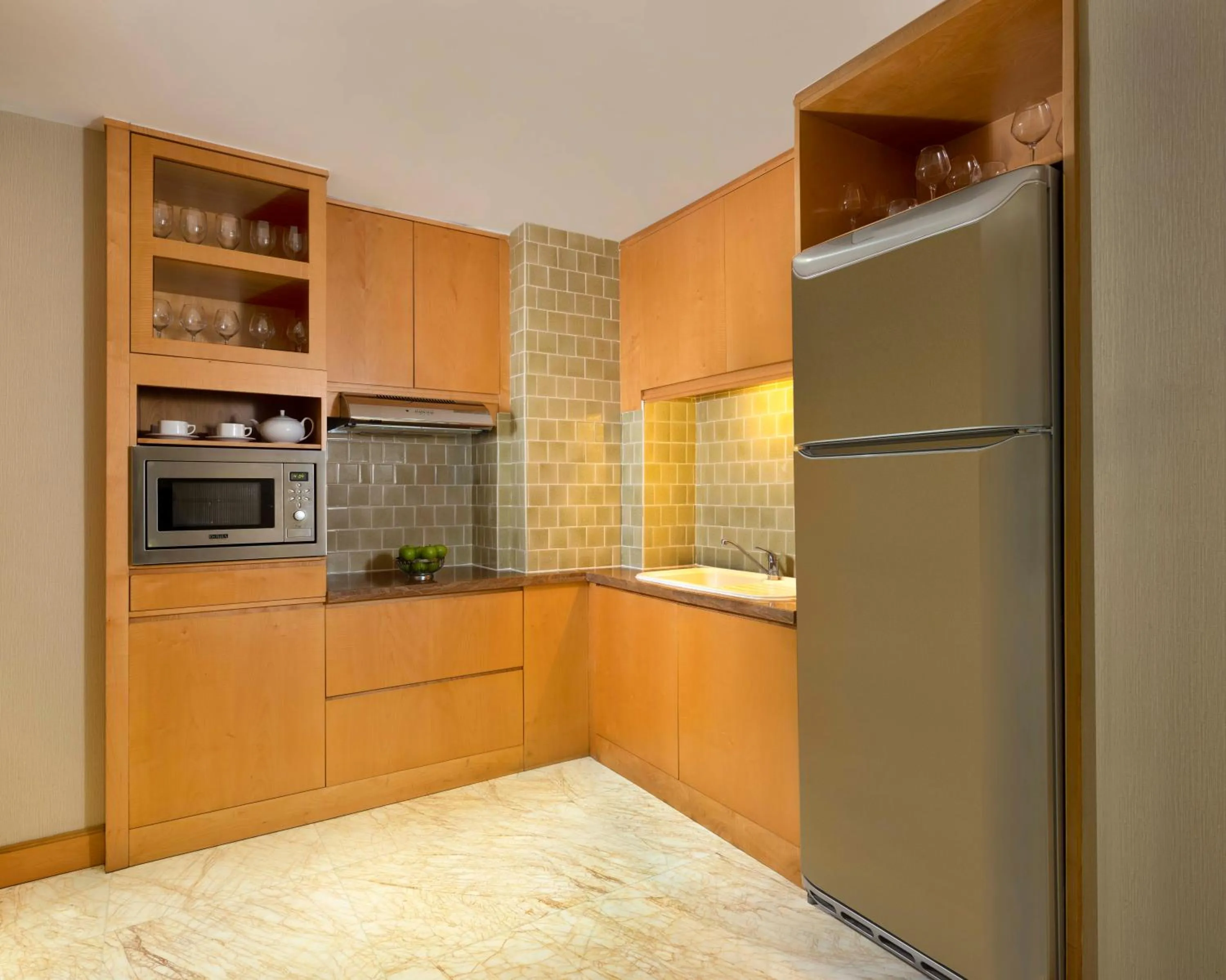 Kitchen or kitchenette in JW Marriott Hotel Medan