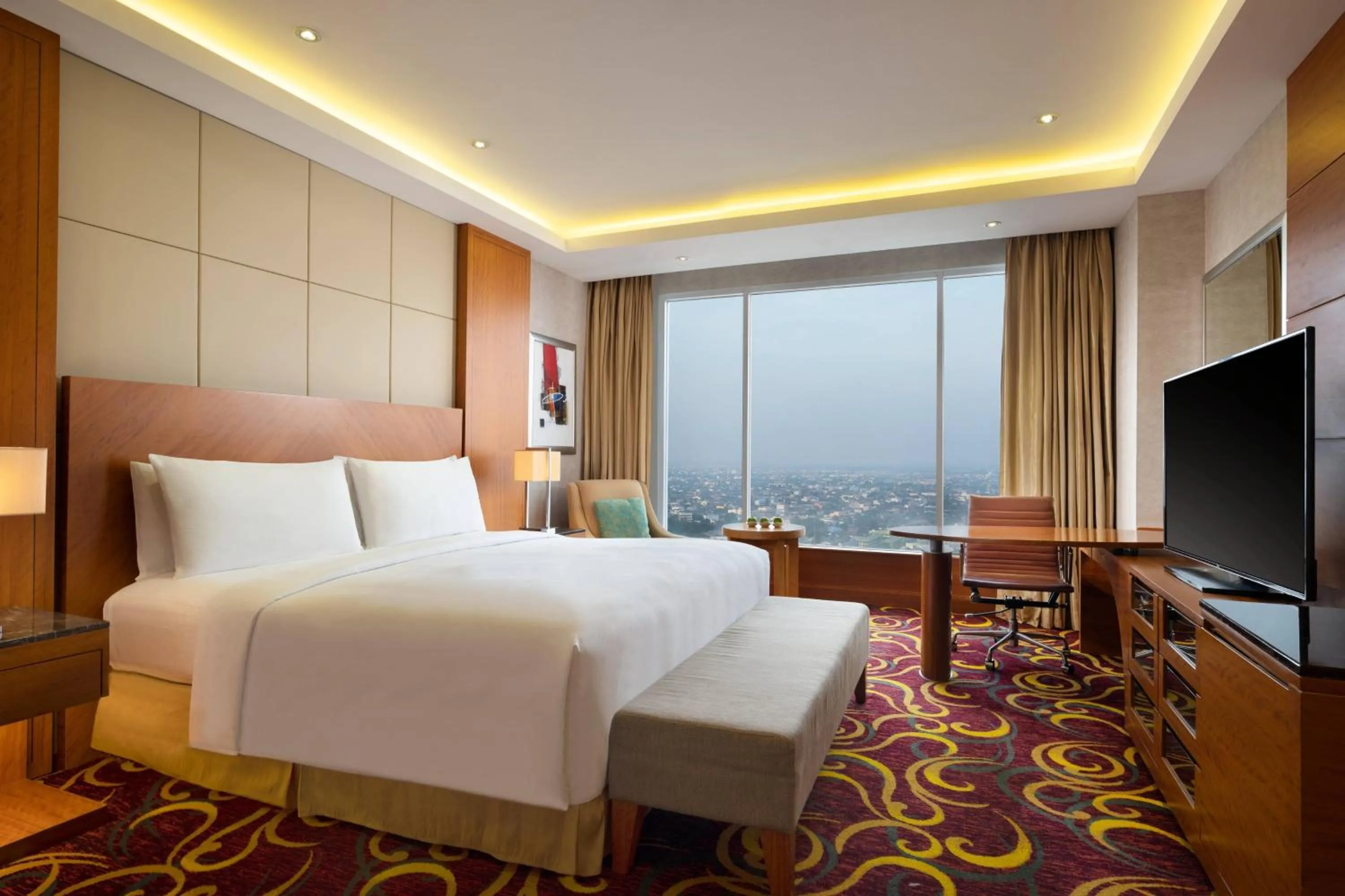 Photo of the whole room, Bed in JW Marriott Hotel Medan