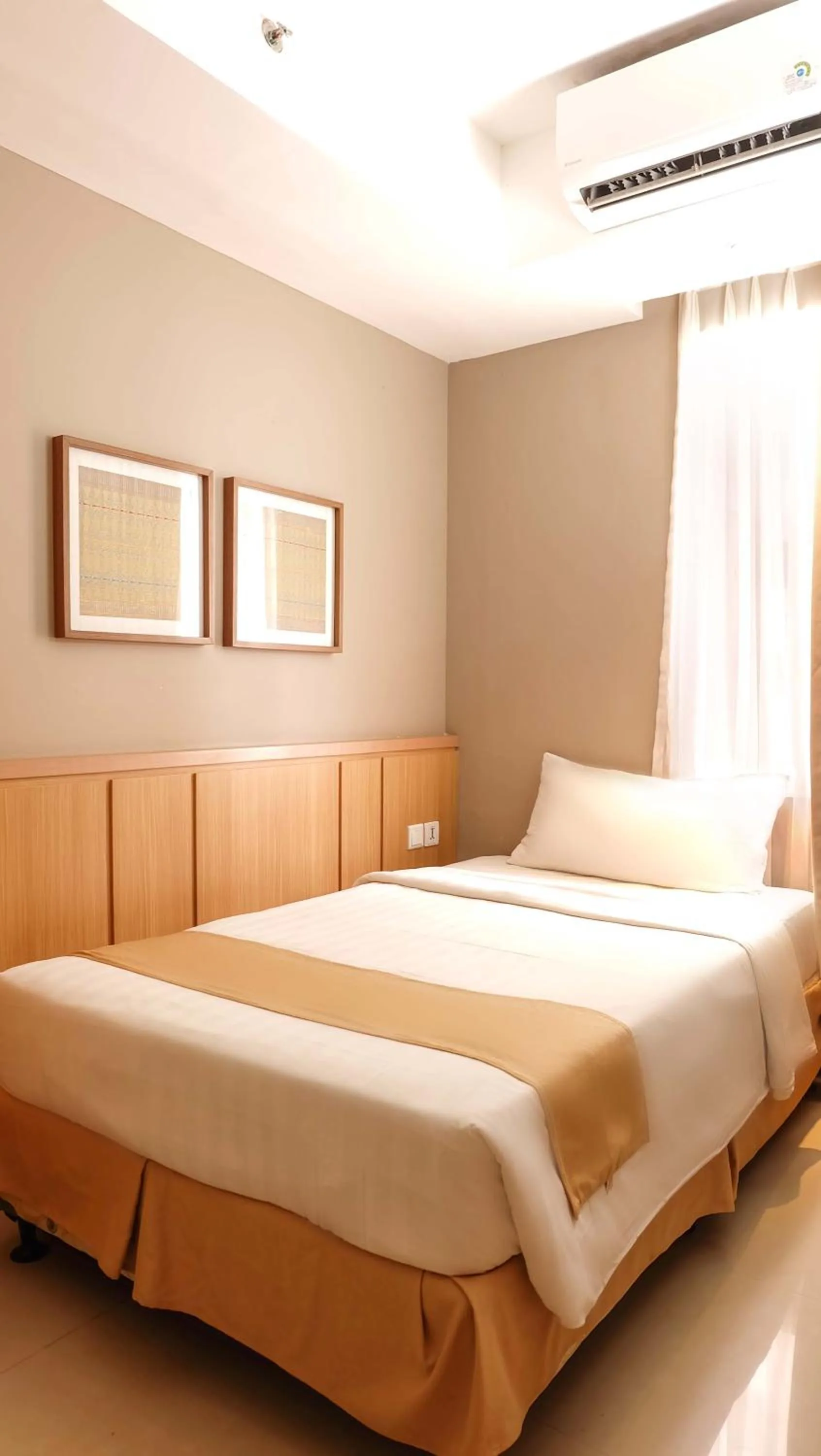 Bed in Golden Tulip Balikpapan Hotel & Suites