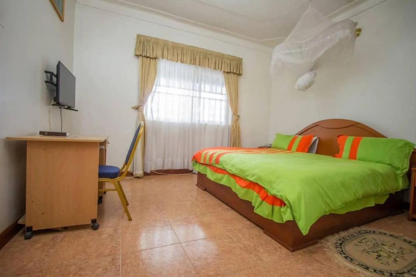 Bed in Zebra Hotel Masaka