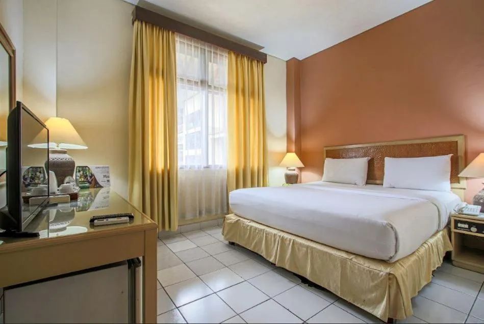 Bed in The Jayakarta Yogyakarta Hotel & Spa