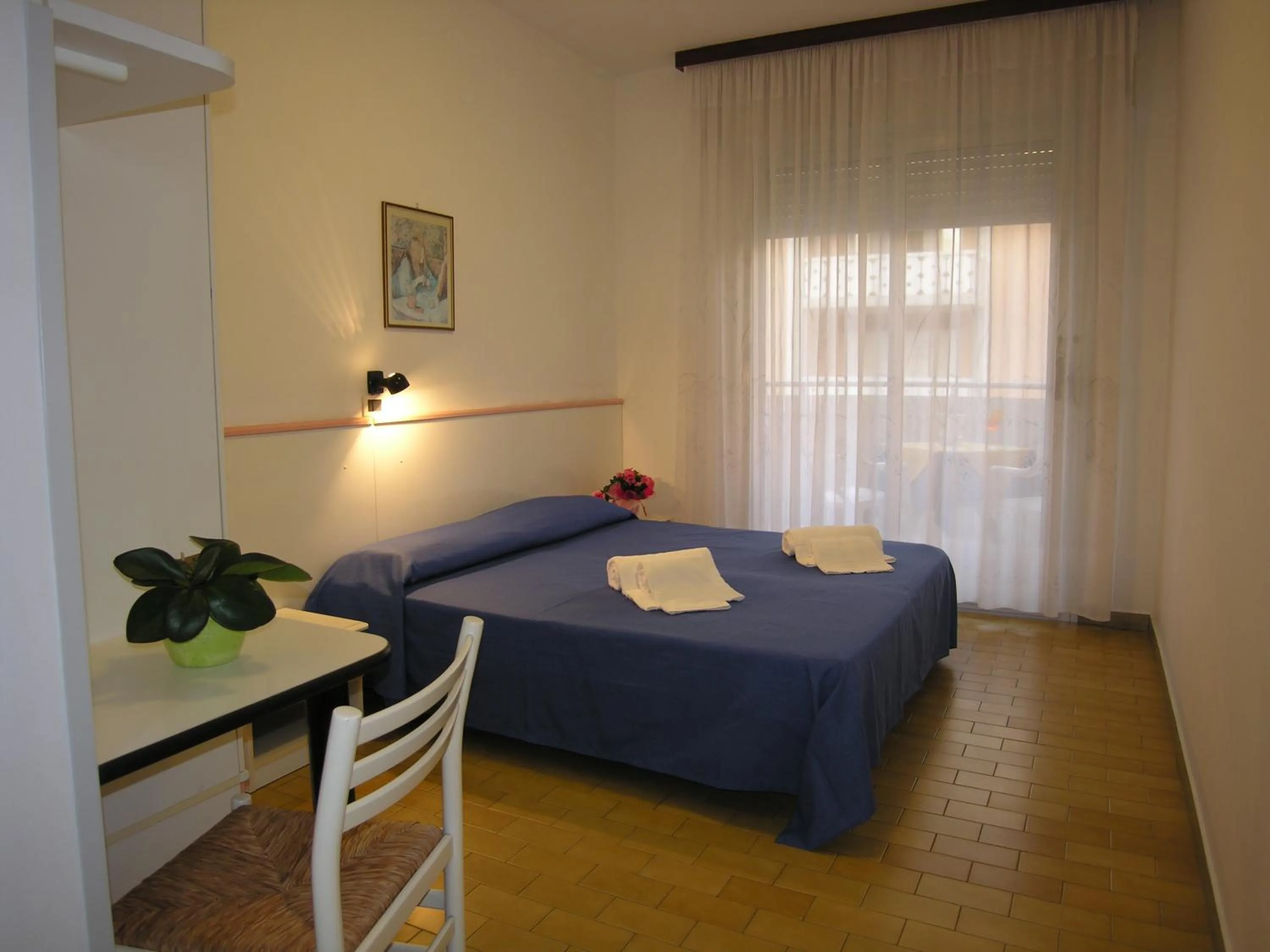 Bed in Hotel Garni Tahiti