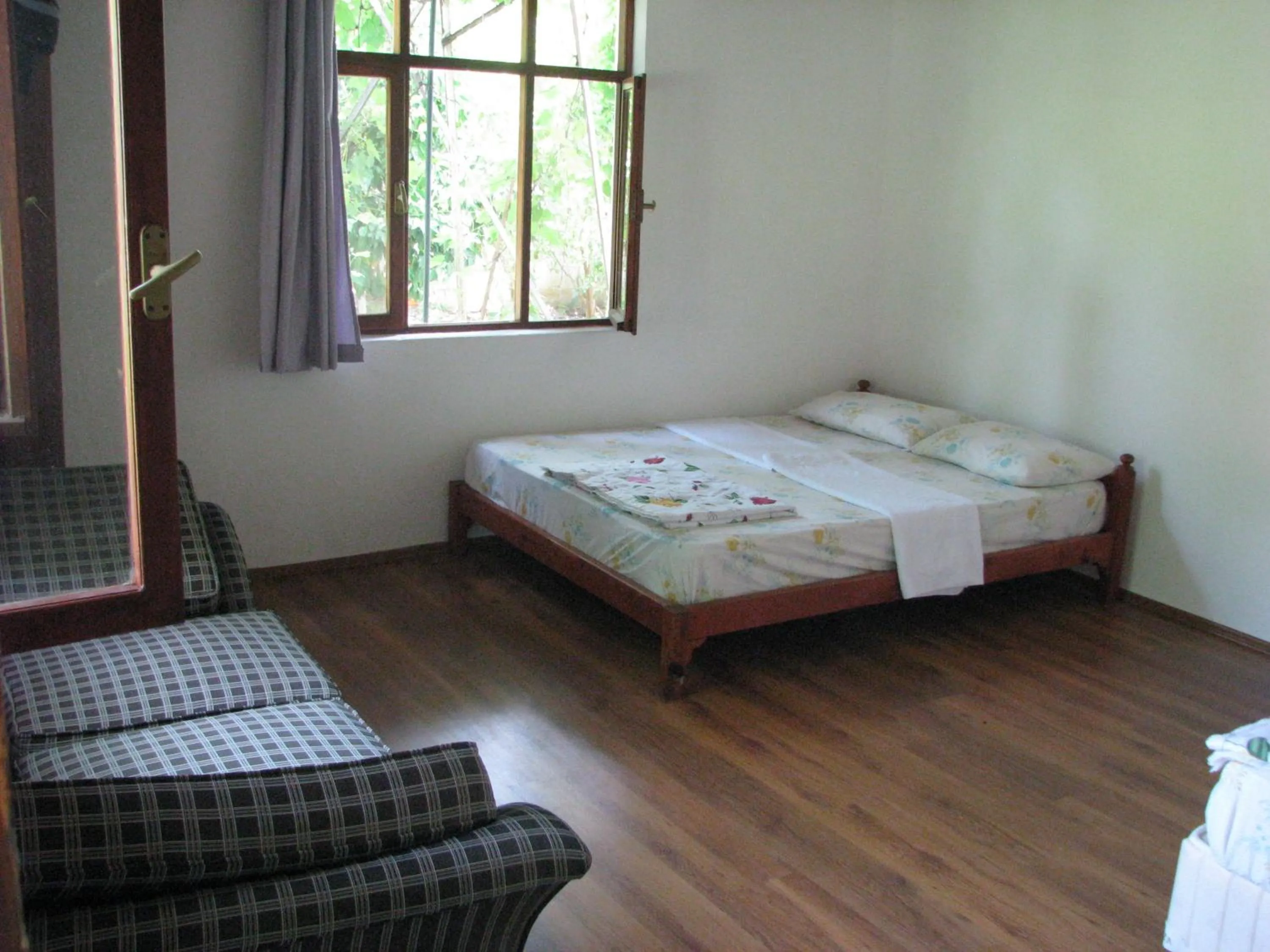 Photo of the whole room, Bed in Alibaba Pension