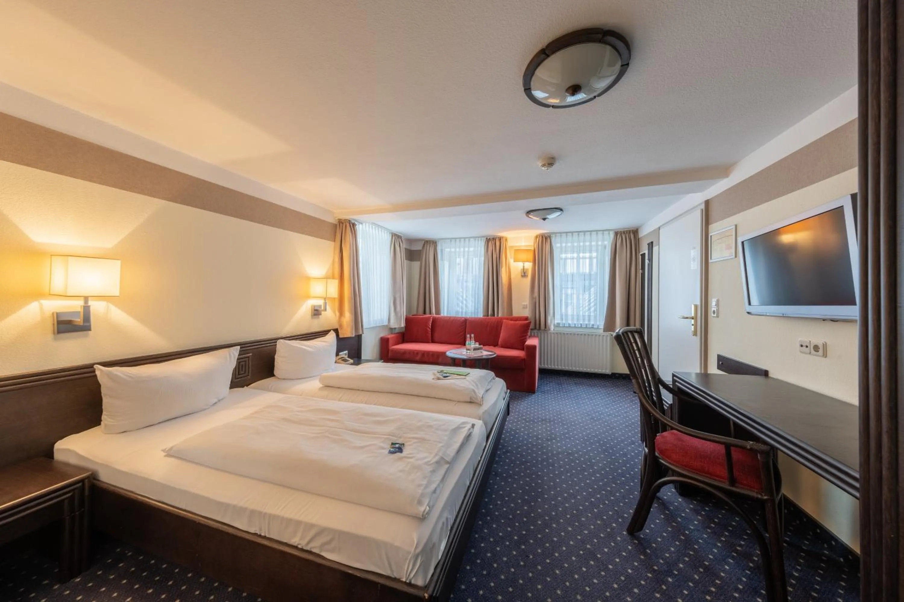 Photo of the whole room, Bed in Brauhaus Zum Löwen