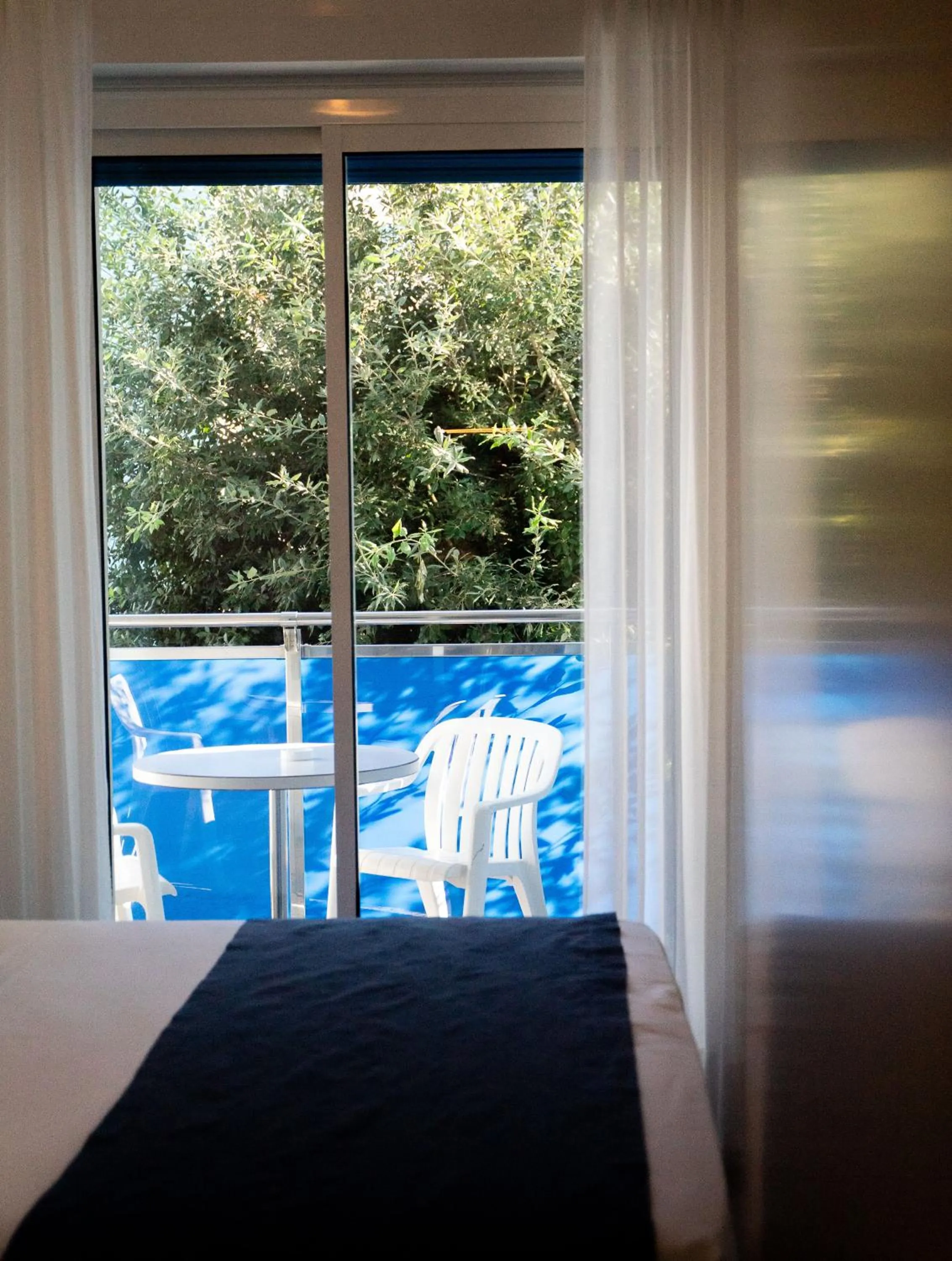 Balcony/Terrace, Bed in Hotel Bahia