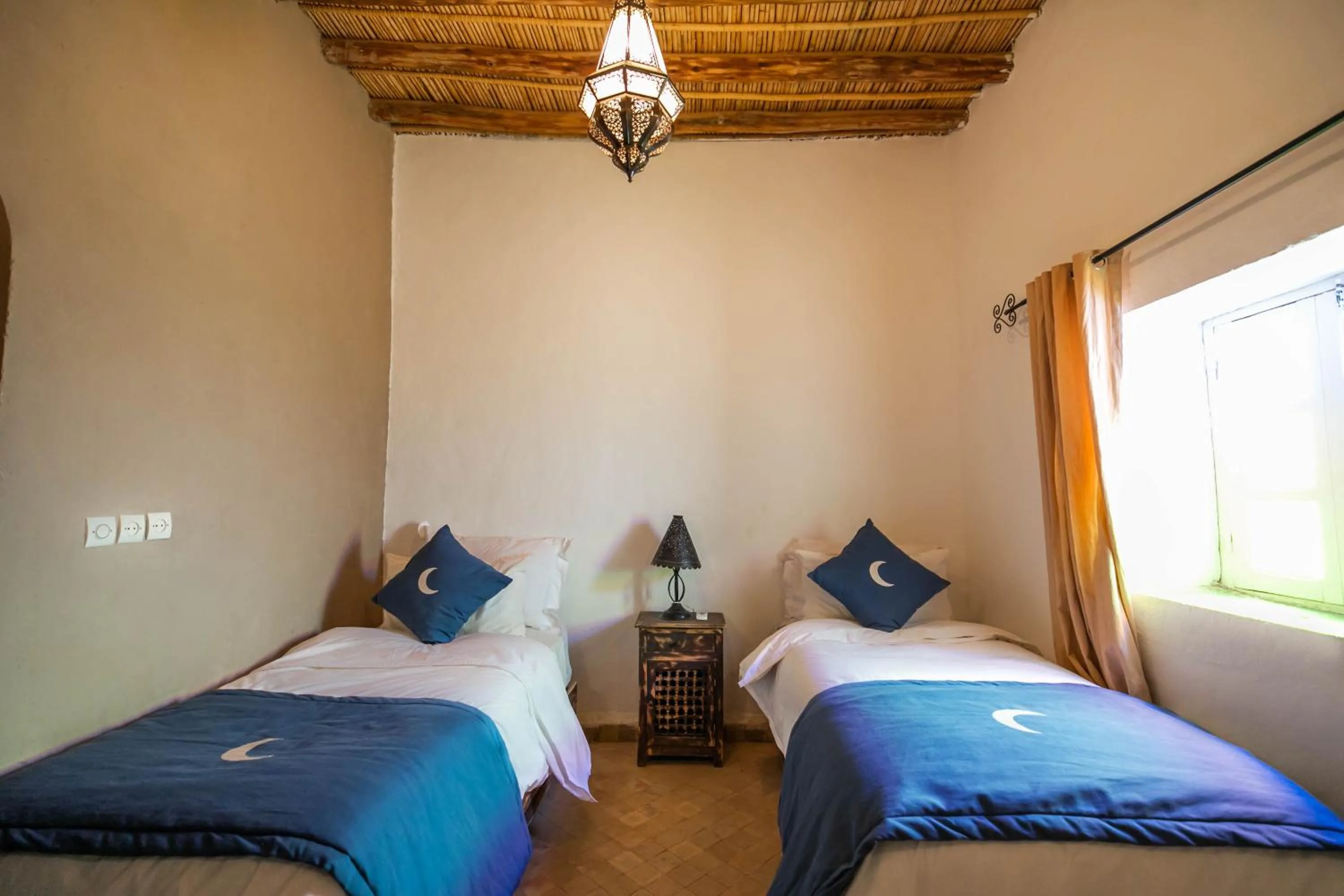 Bed in Riad Kasbah Aiour