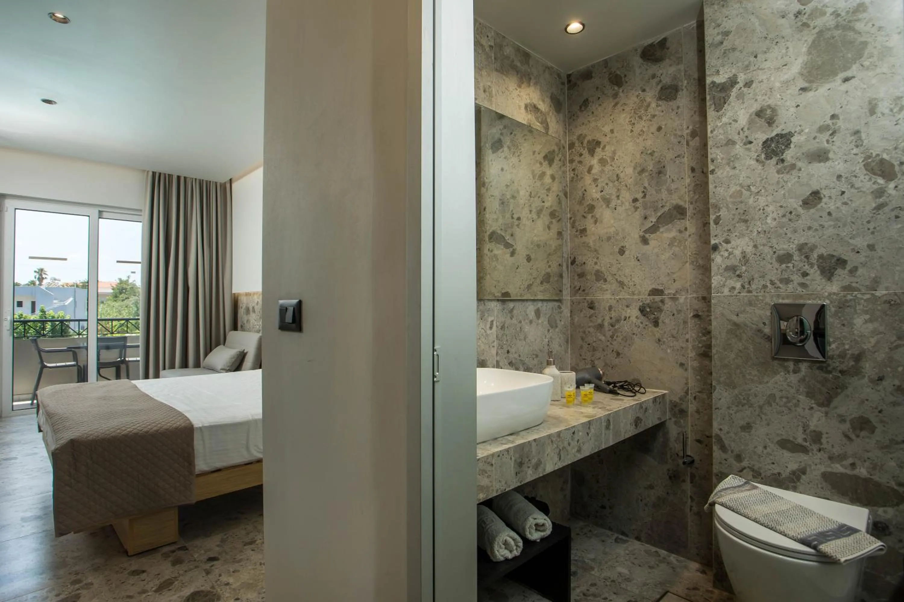 Bed in Dias Studios & Suites