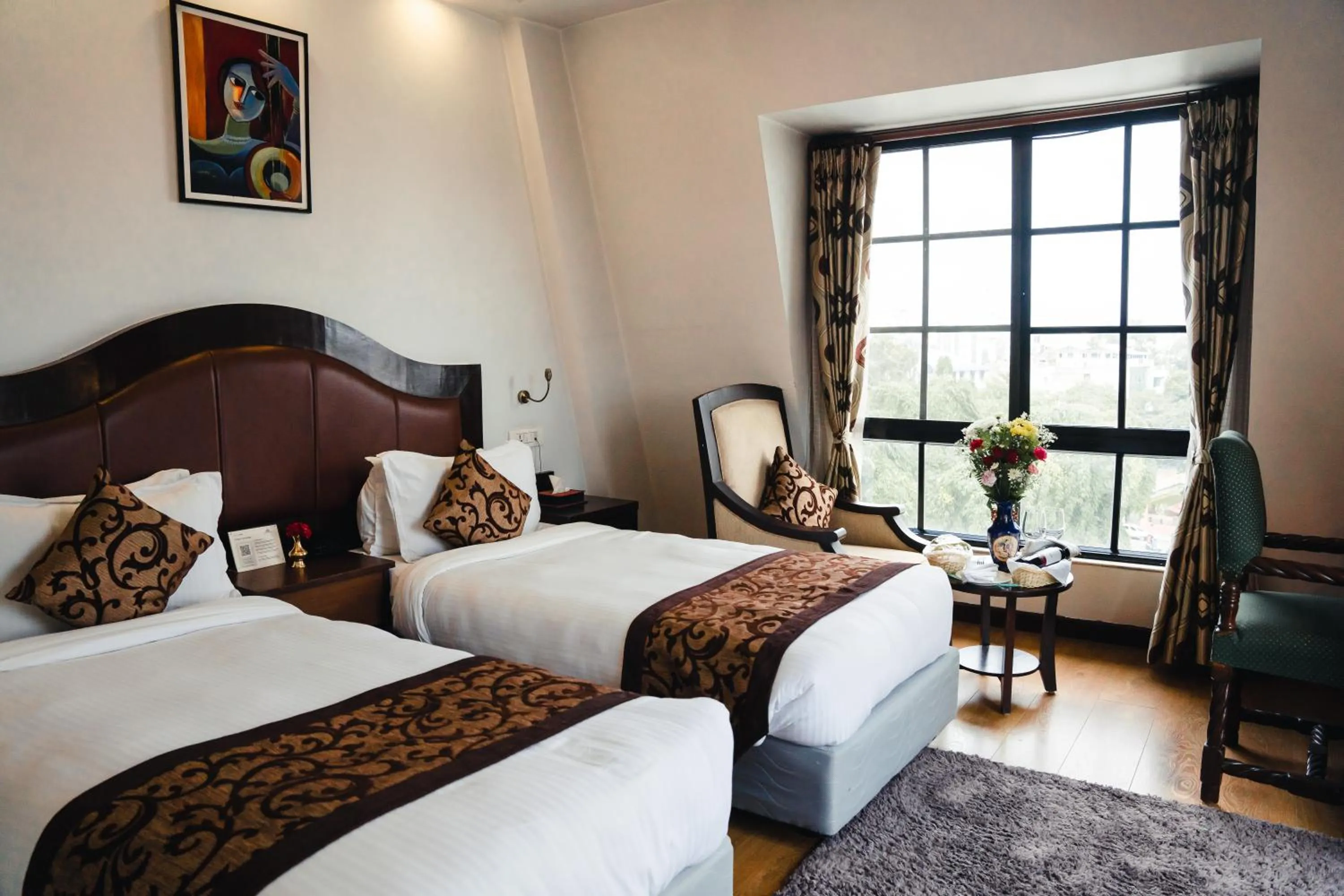 Bed in Maya Manor Boutique Hotel by KGH Group