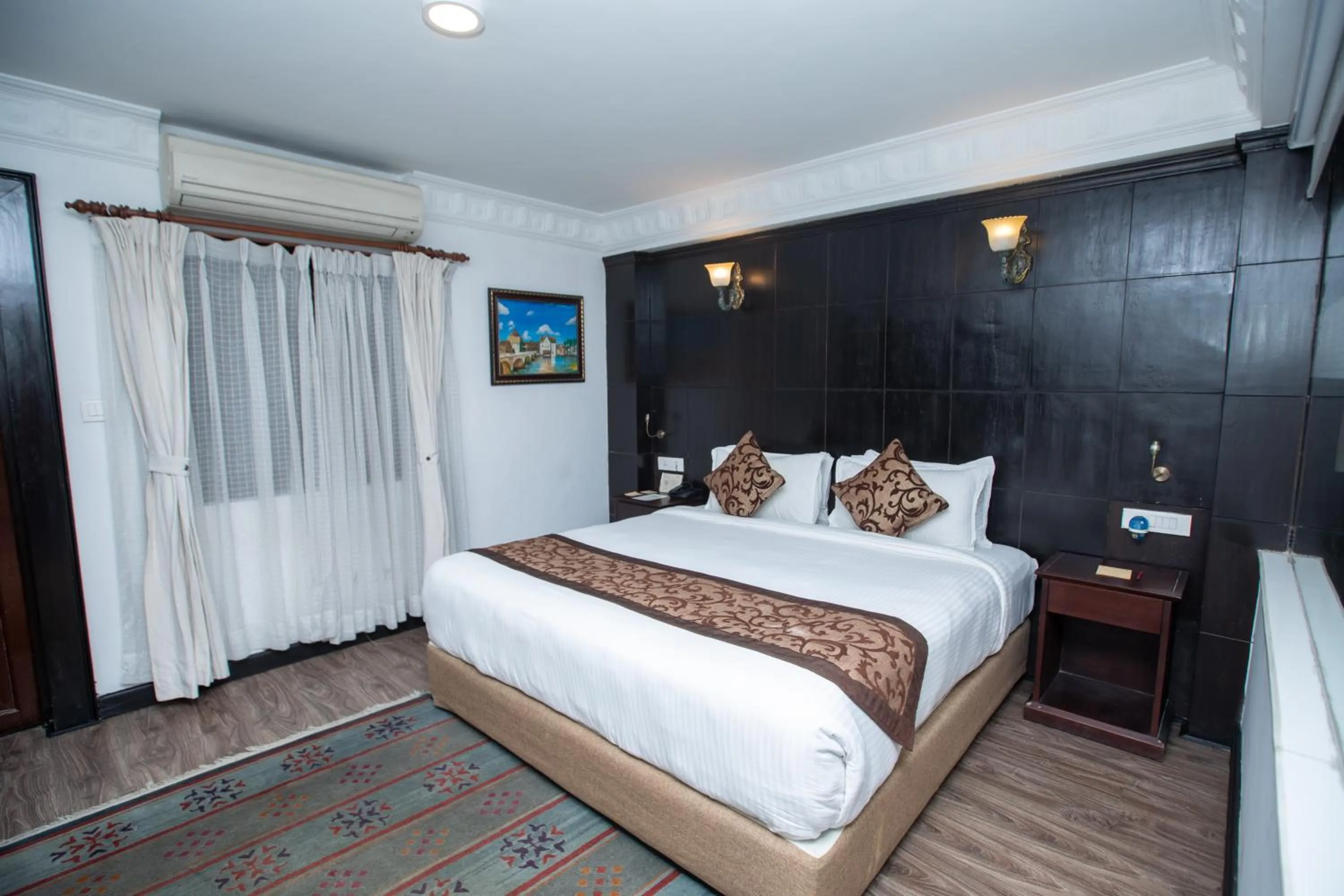 Bed in Maya Manor Boutique Hotel by KGH Group