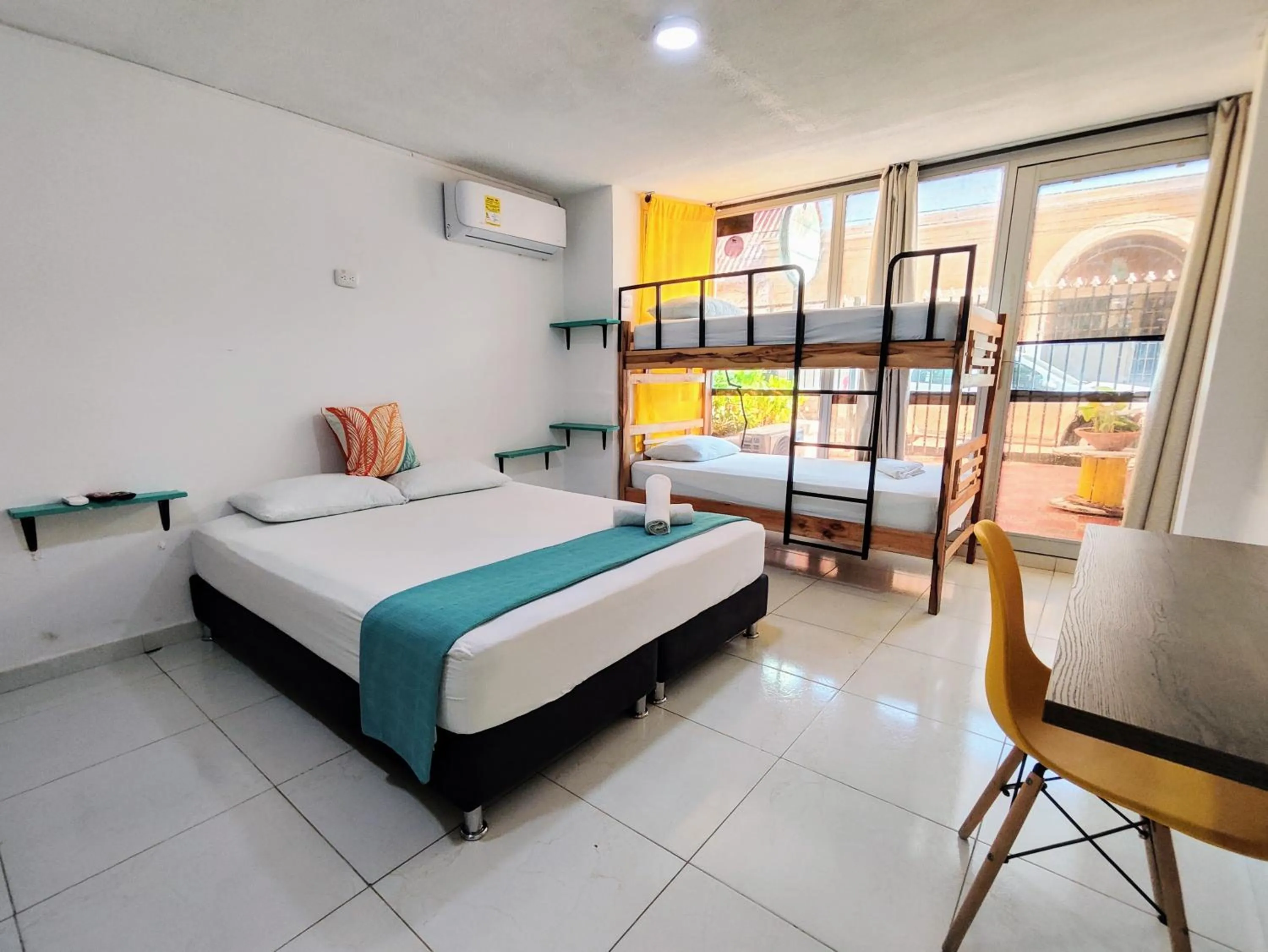 Bed in Bona Vida Hotel