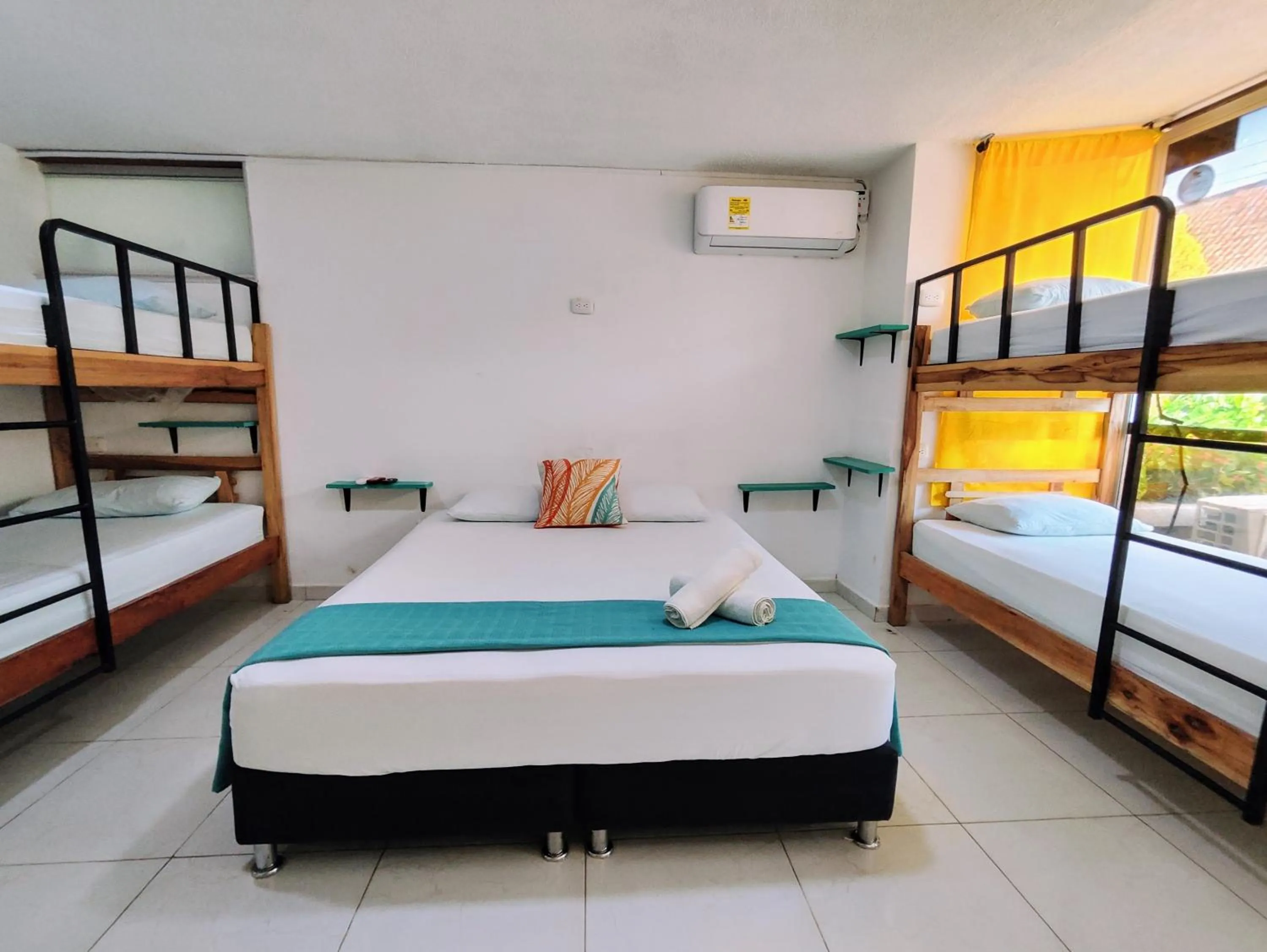 Bed in Bona Vida Hotel