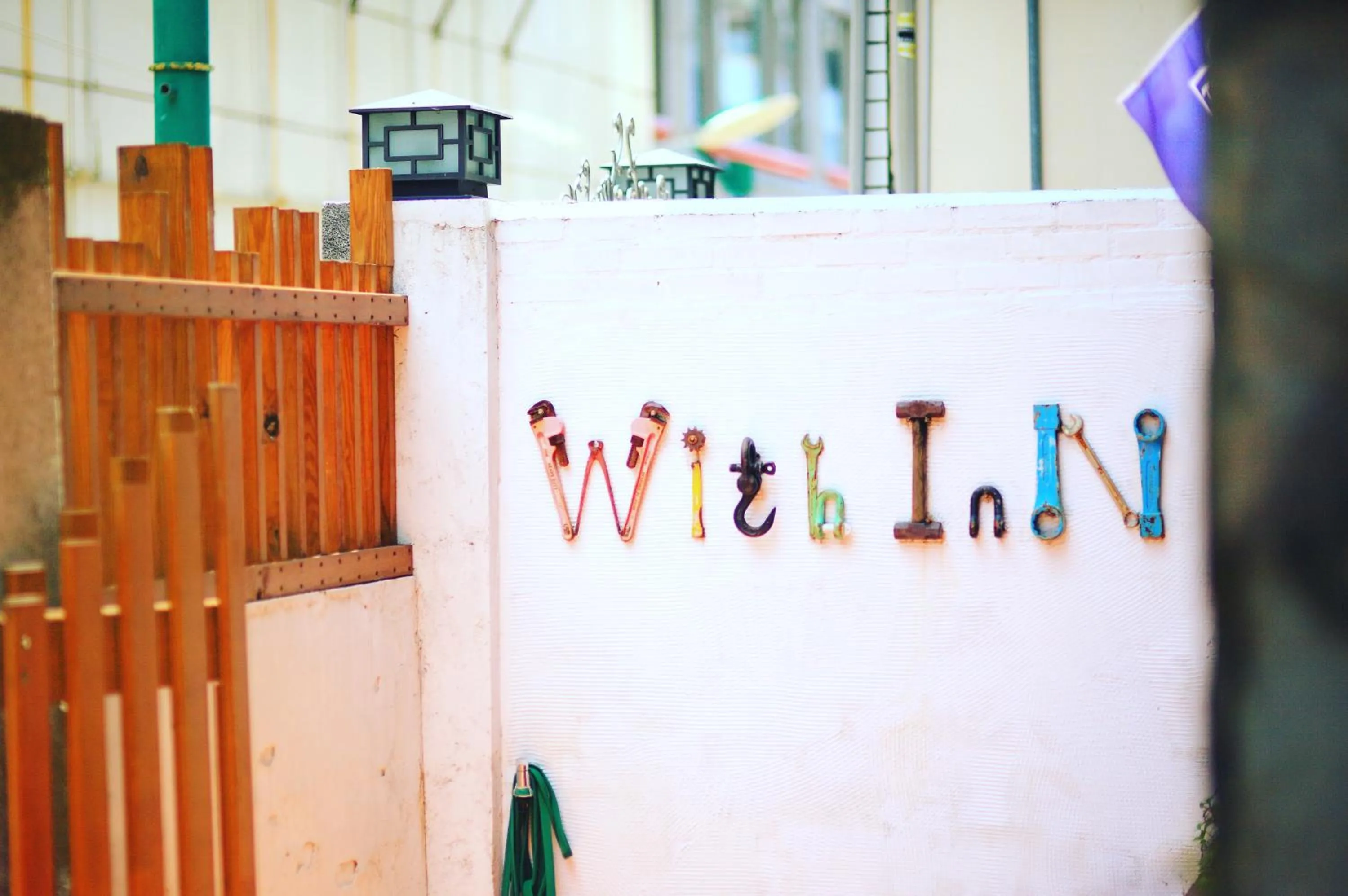 Property logo or sign in With Inn Hostel