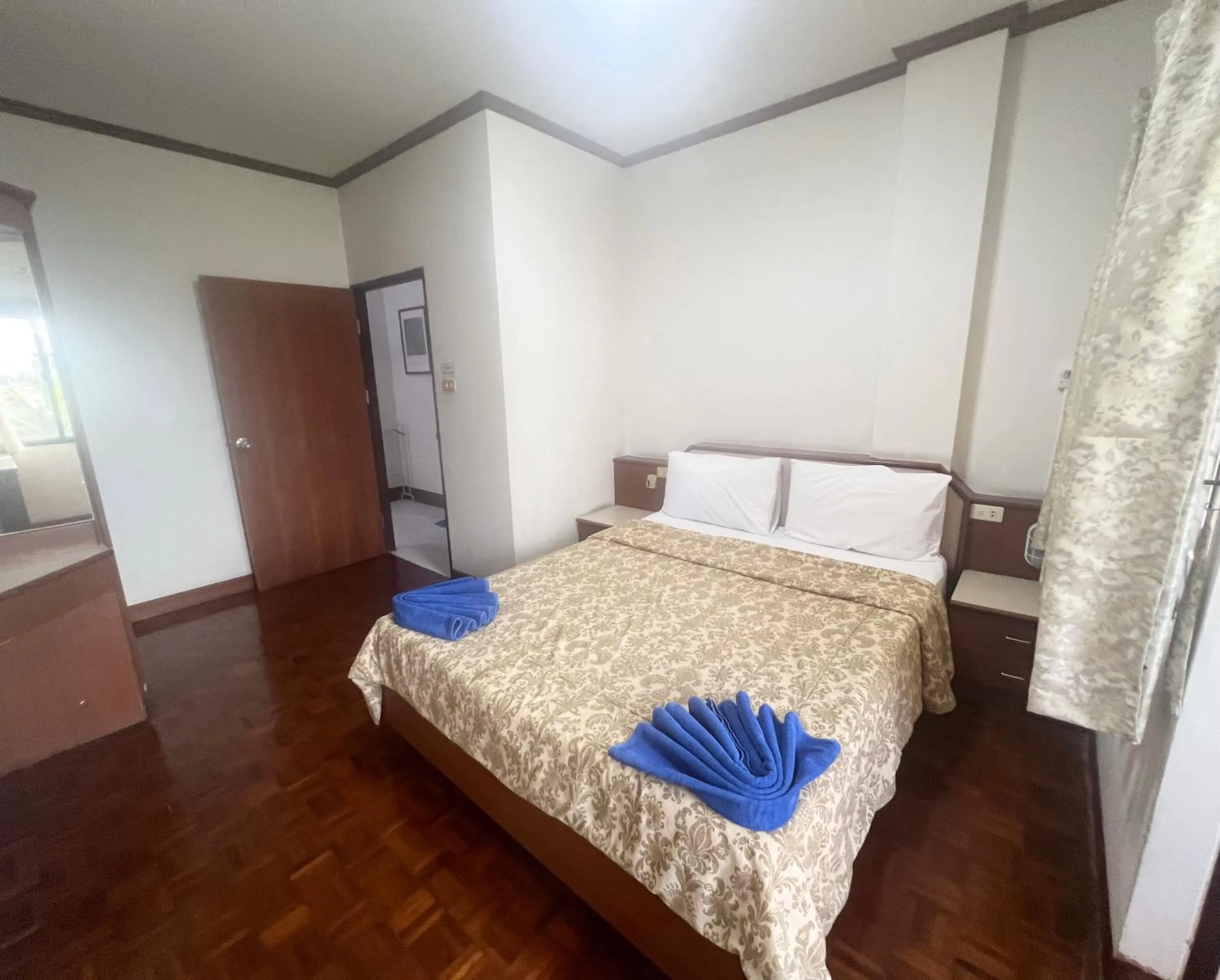 Bed in Muang Thong Family Suite Hatyai