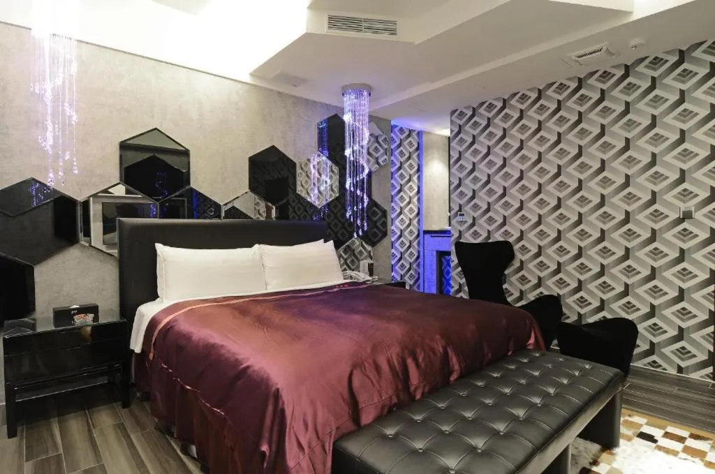 Photo of the whole room, Bed in M Hotel