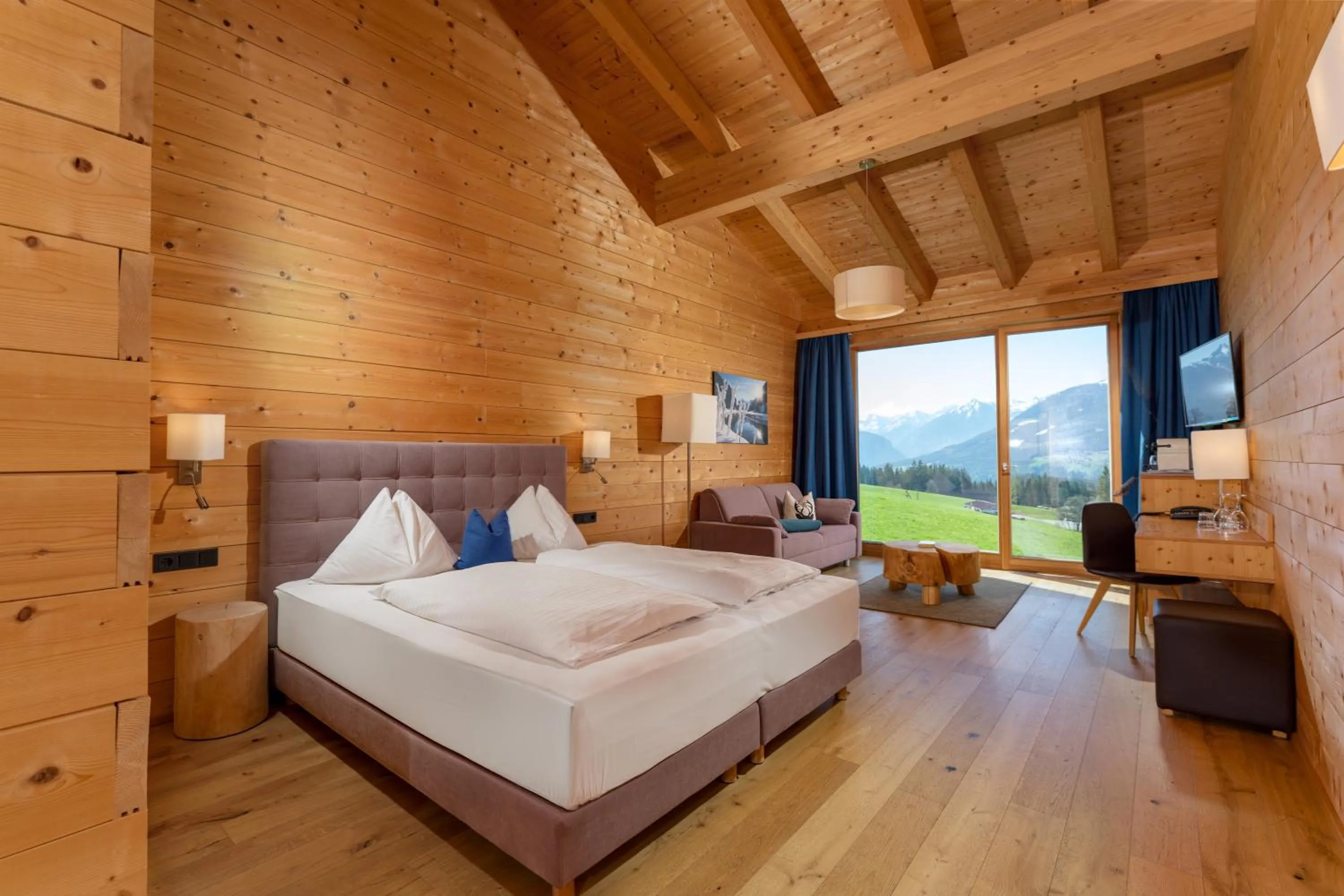 Communal lounge/ TV room, Bed in Rittis Alpin Chalets Dachstein