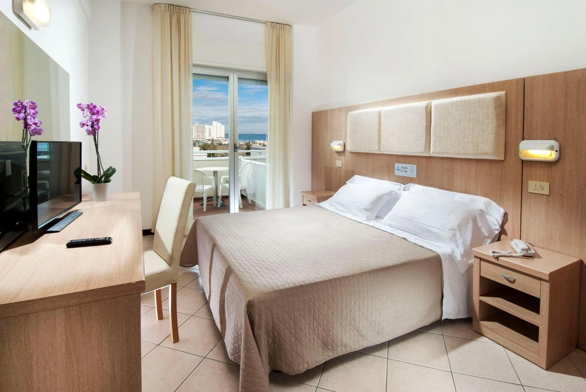 TV and multimedia, Bed in Hotel Cormoran