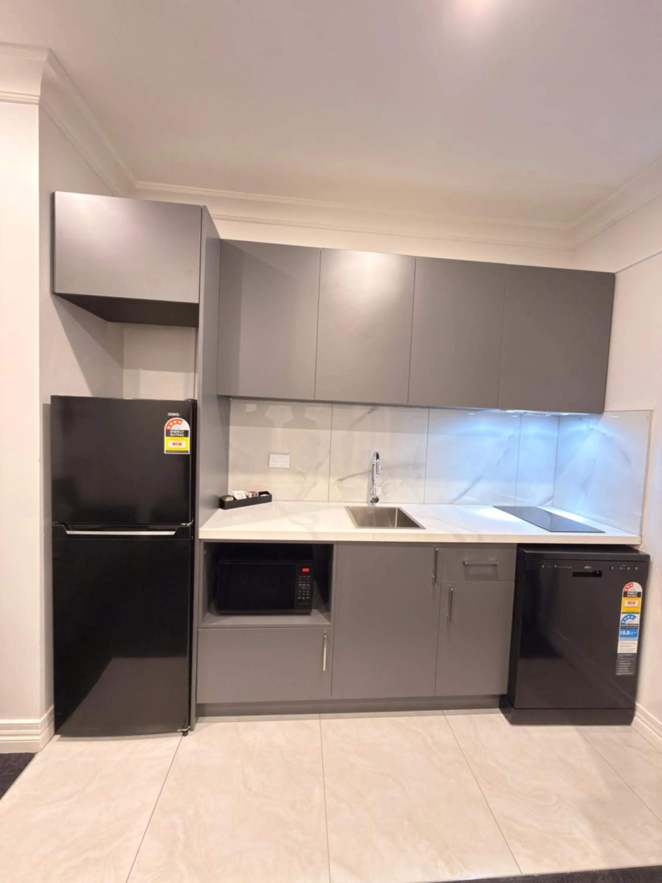 kitchen in Comfort Apartments Melbourne Central