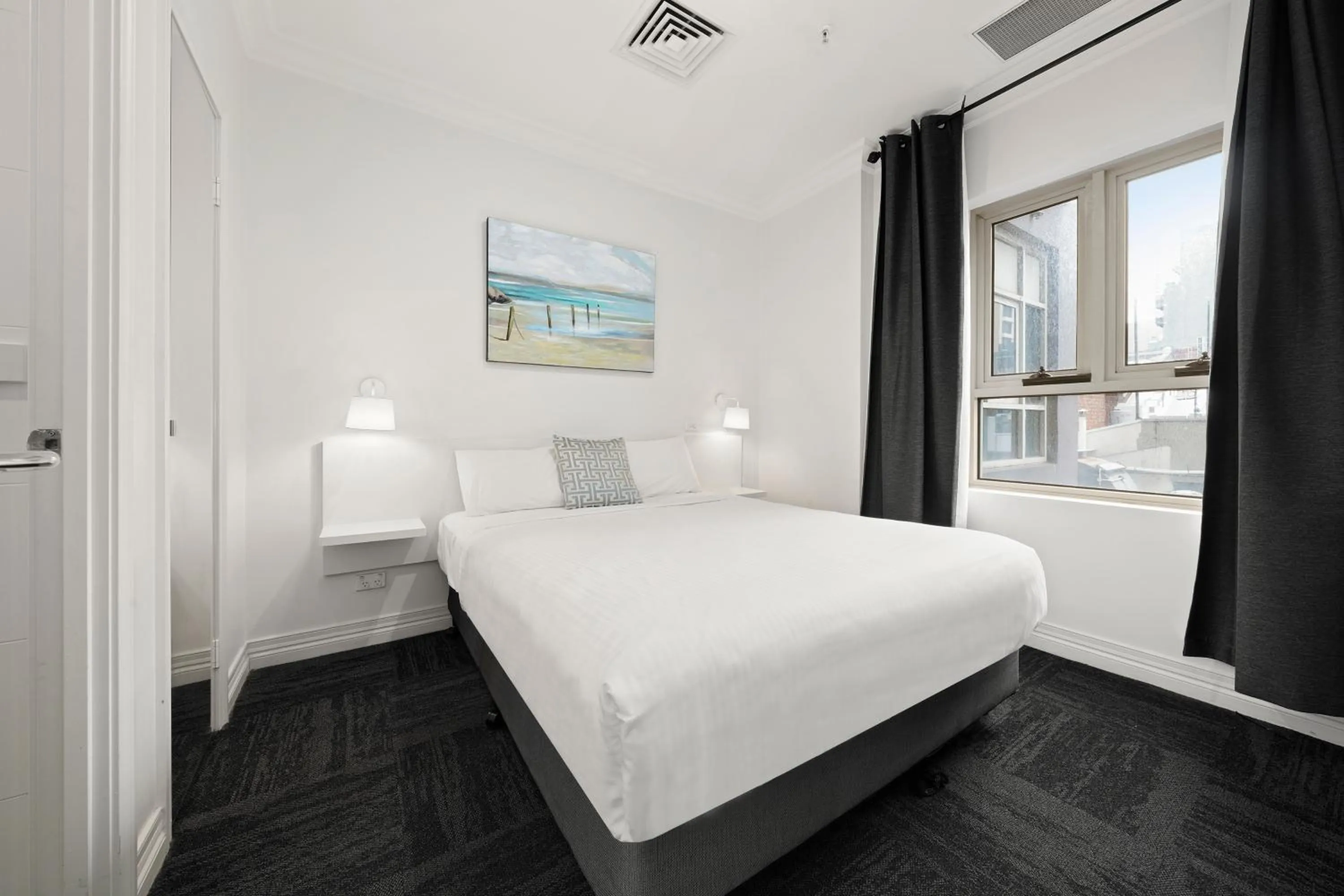 Bed in Comfort Apartments Melbourne Central