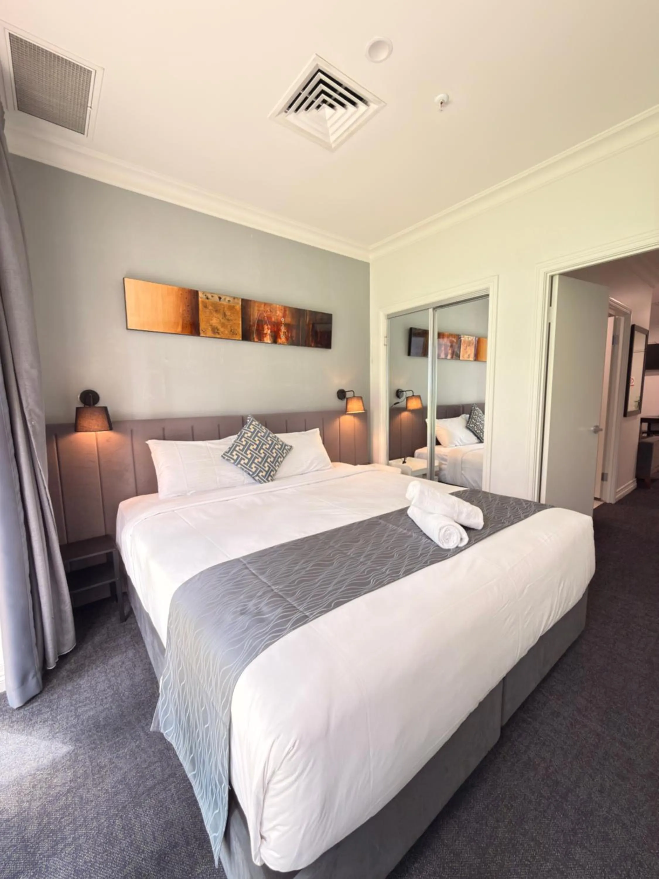 Bed in Comfort Apartments Melbourne Central