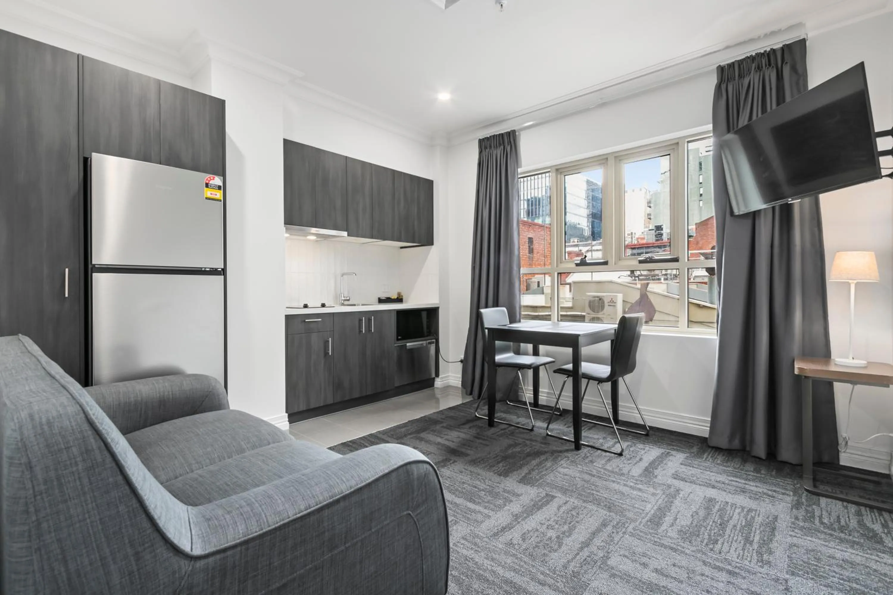 TV and multimedia in Comfort Apartments Melbourne Central
