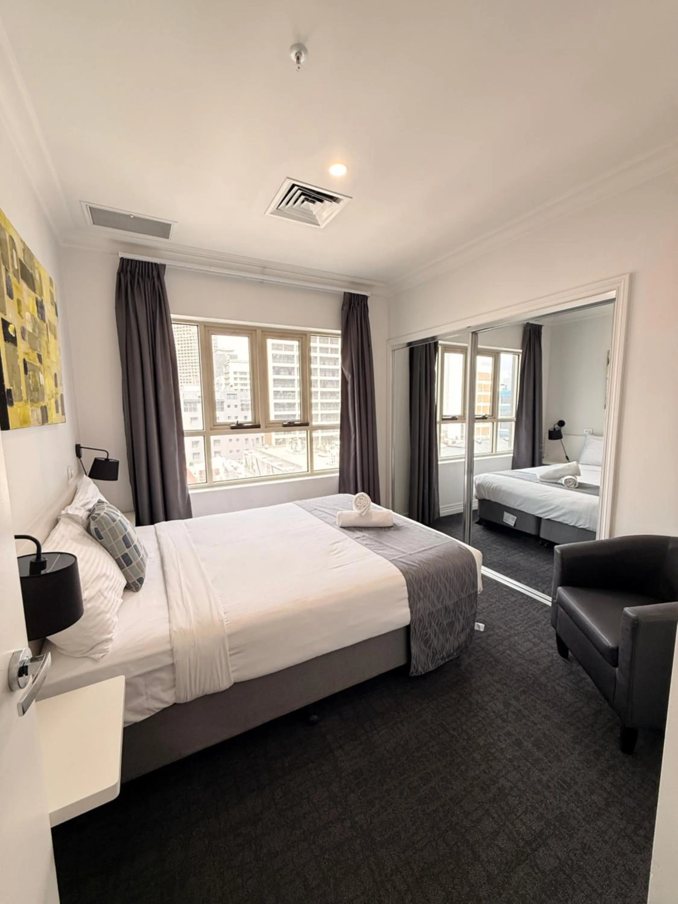 Bed in Comfort Apartments Melbourne Central
