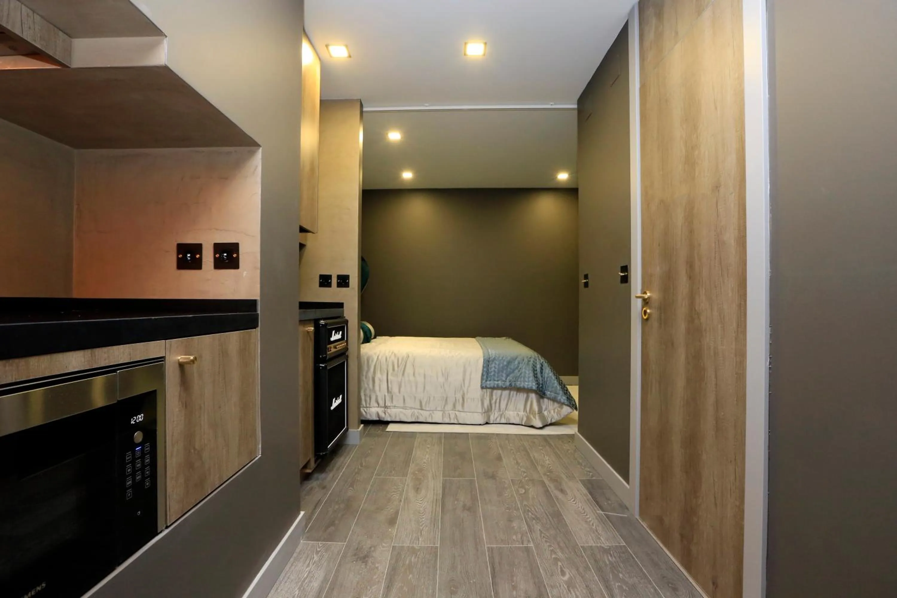 Photo of the whole room, Bed in Charm Flats