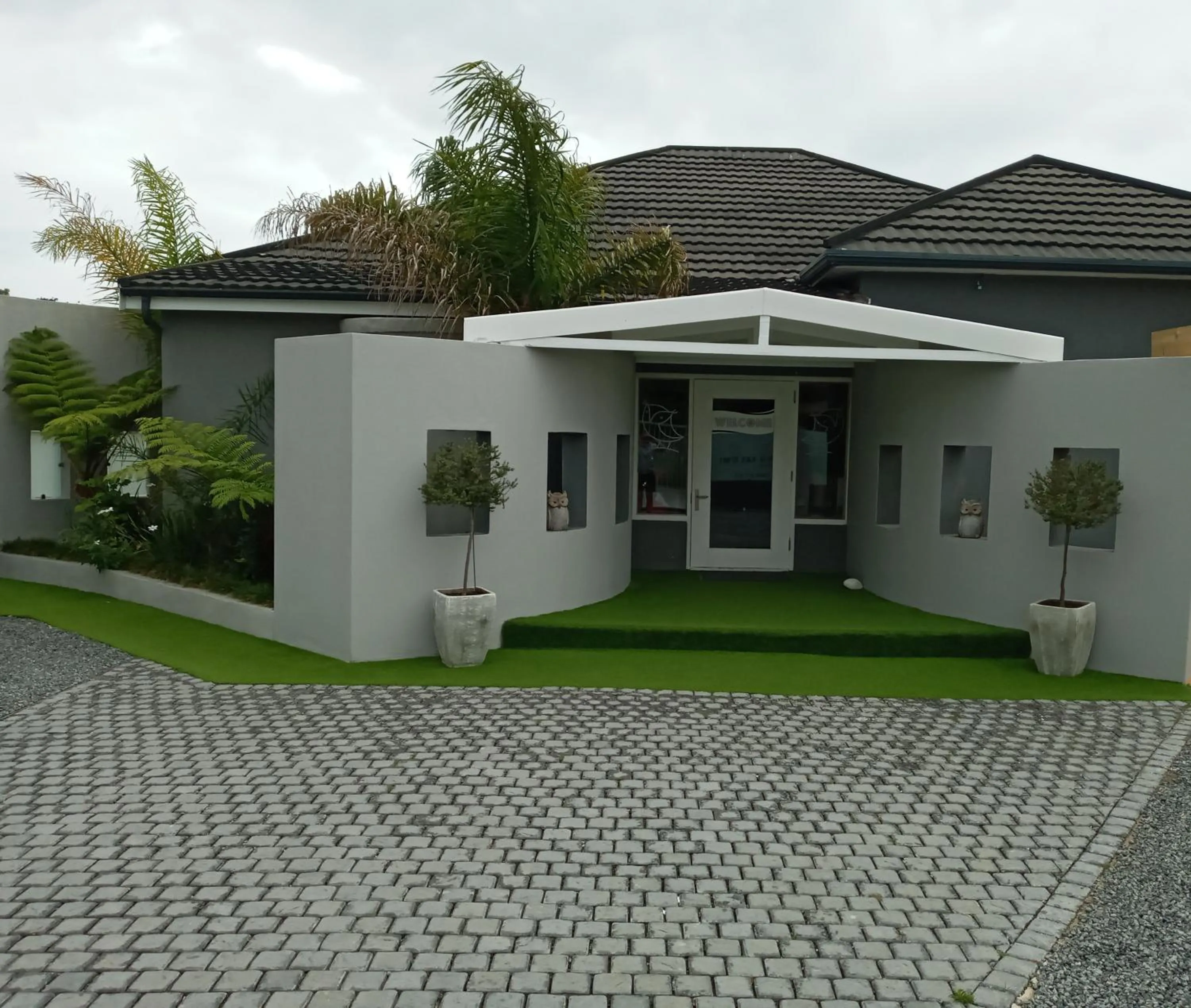 Property building in Two Fat Owls Guesthouse