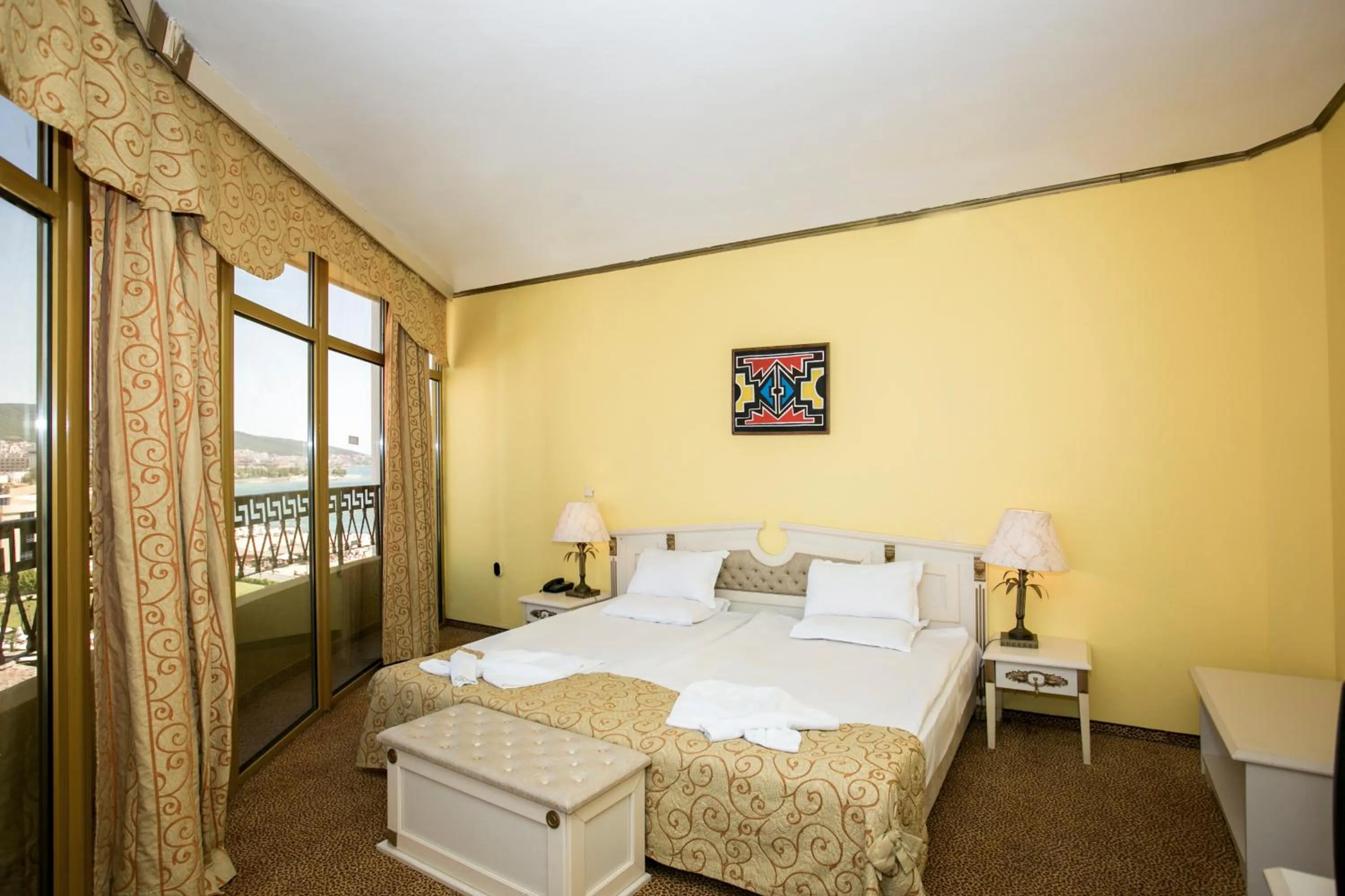 Bed in Imperial Palace Hotel