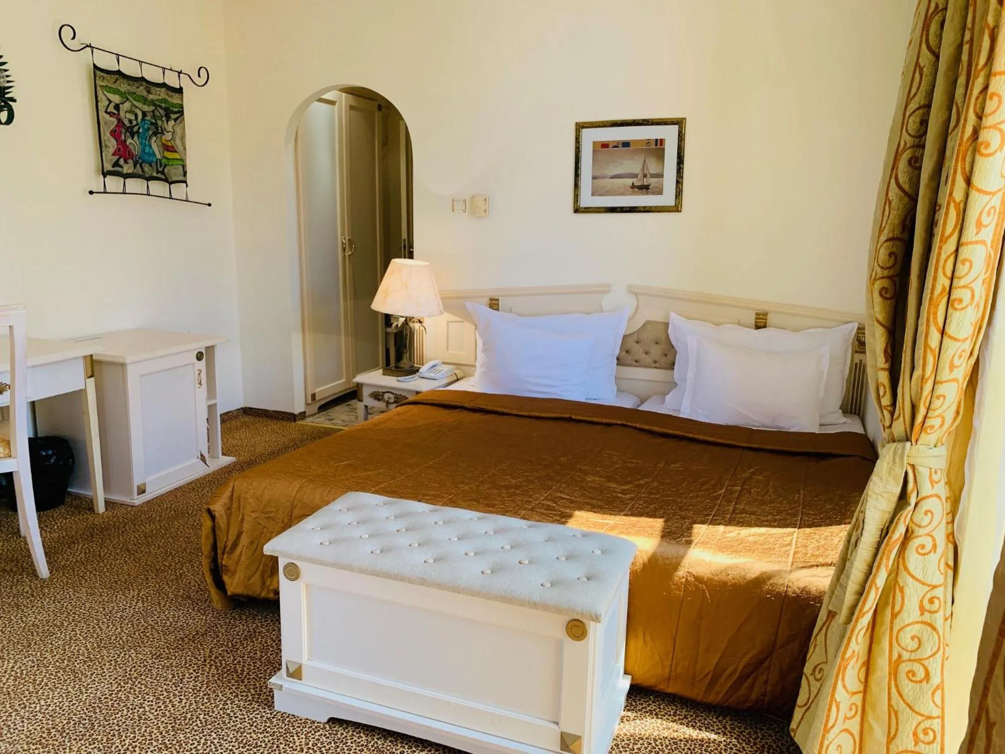 Bed in Imperial Palace Hotel