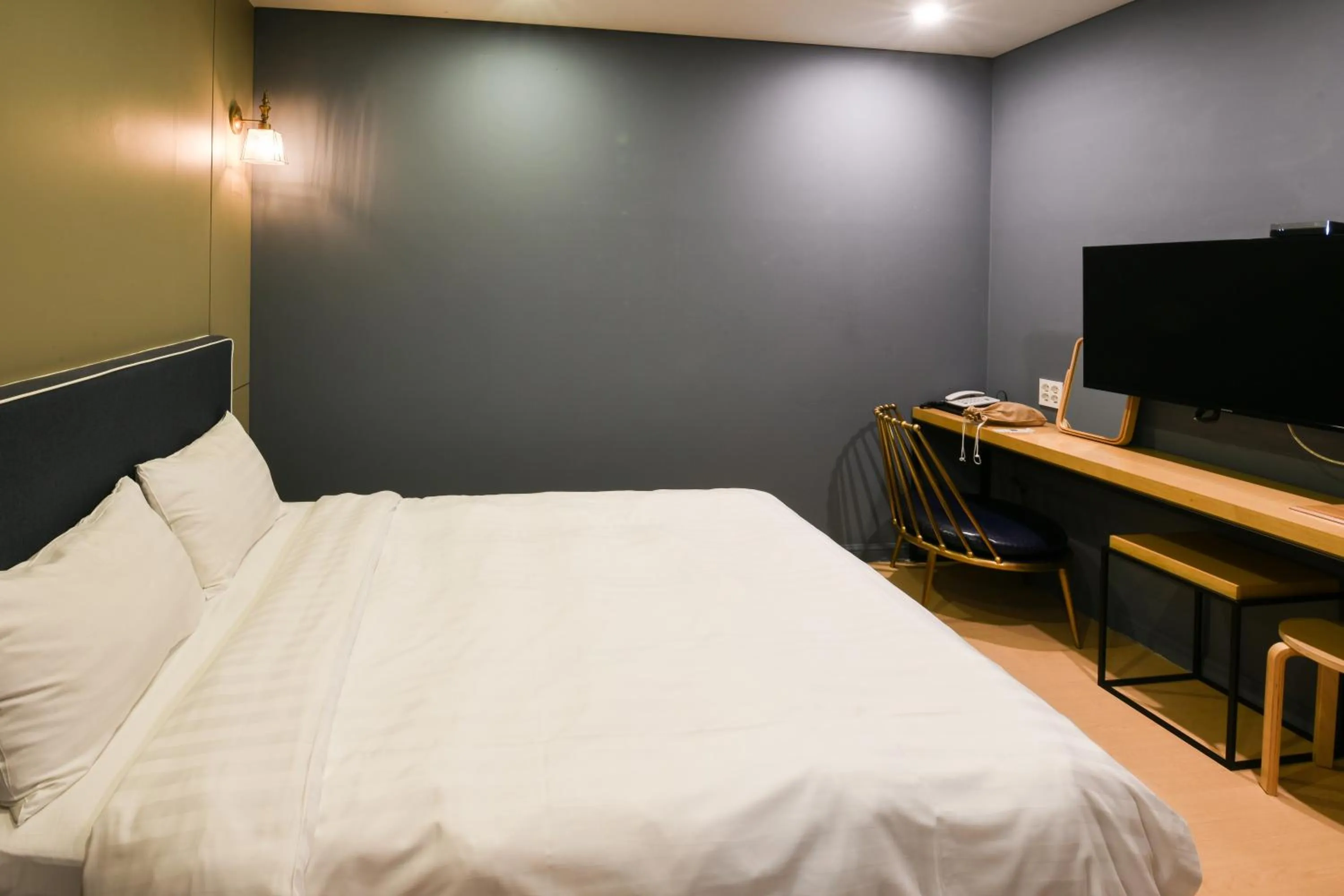 Bed in Urban Island Hotel Jeju